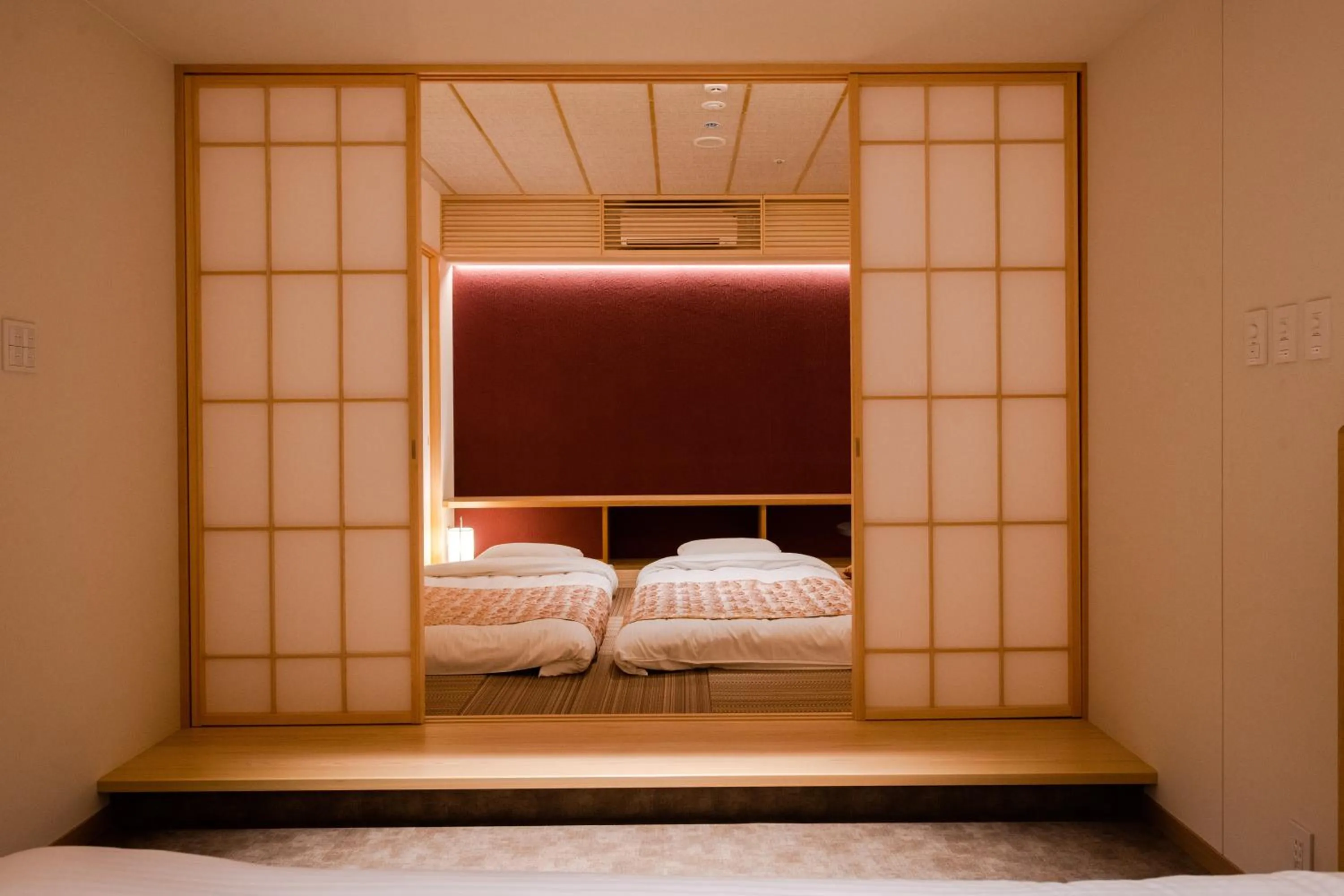 Bed in GuestHouse MIYABI Premium