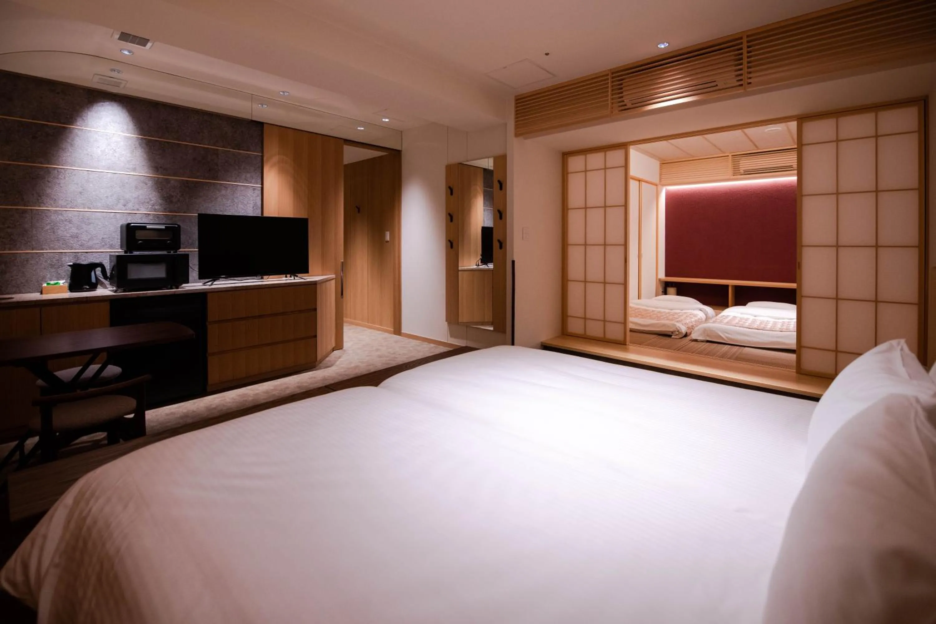 Bed in GuestHouse MIYABI Premium