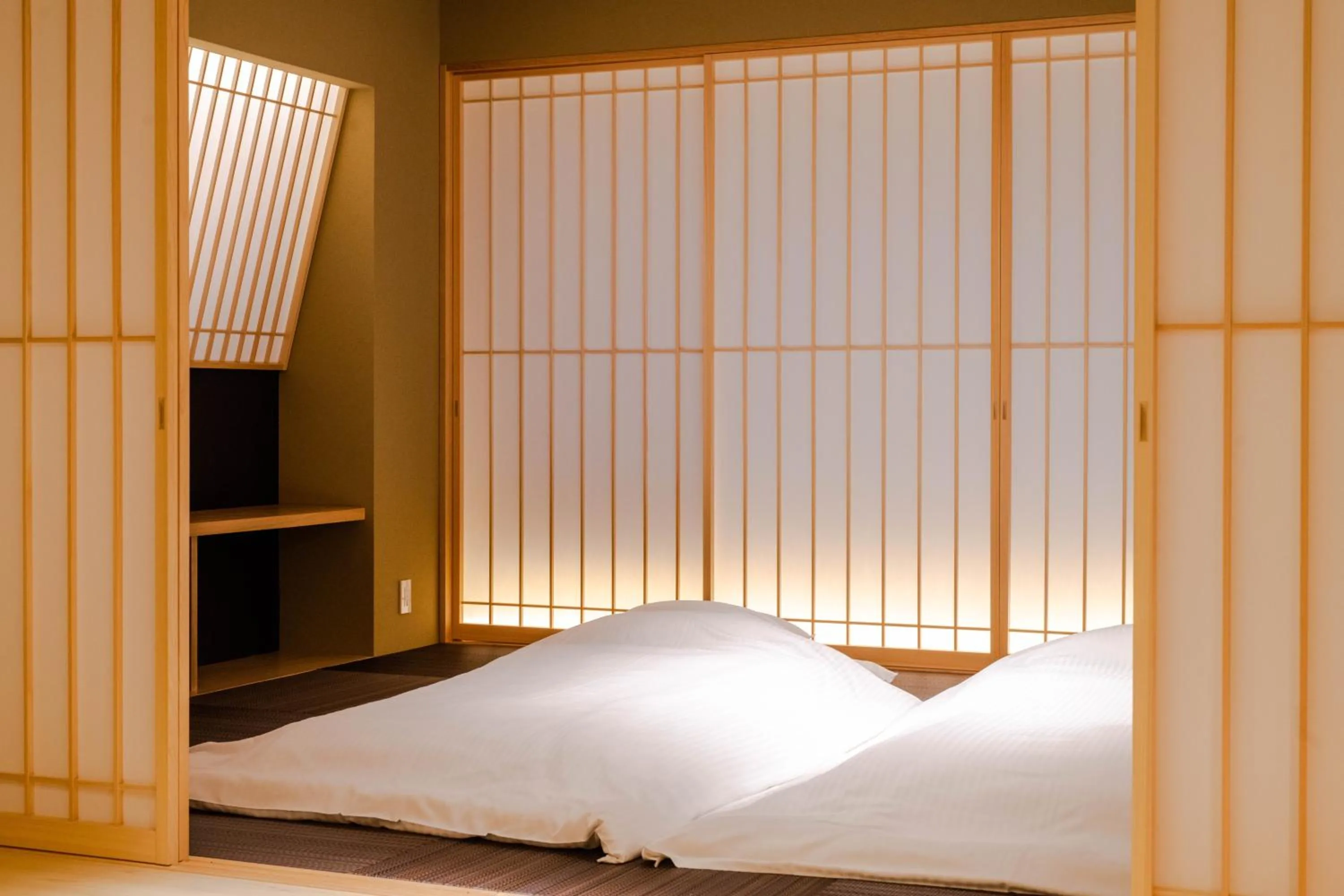 Bed in GuestHouse MIYABI Premium
