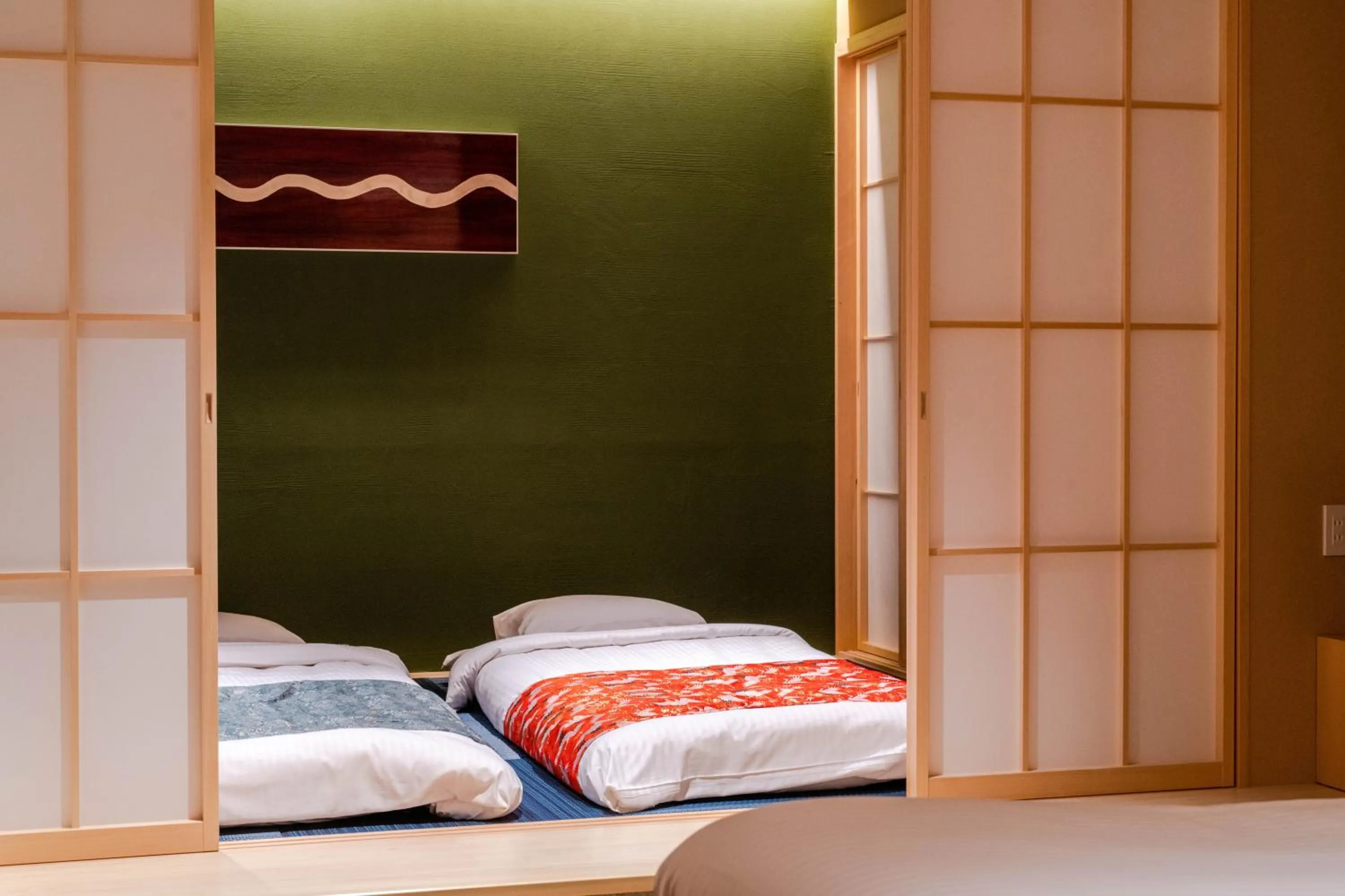 Bed in GuestHouse MIYABI Premium