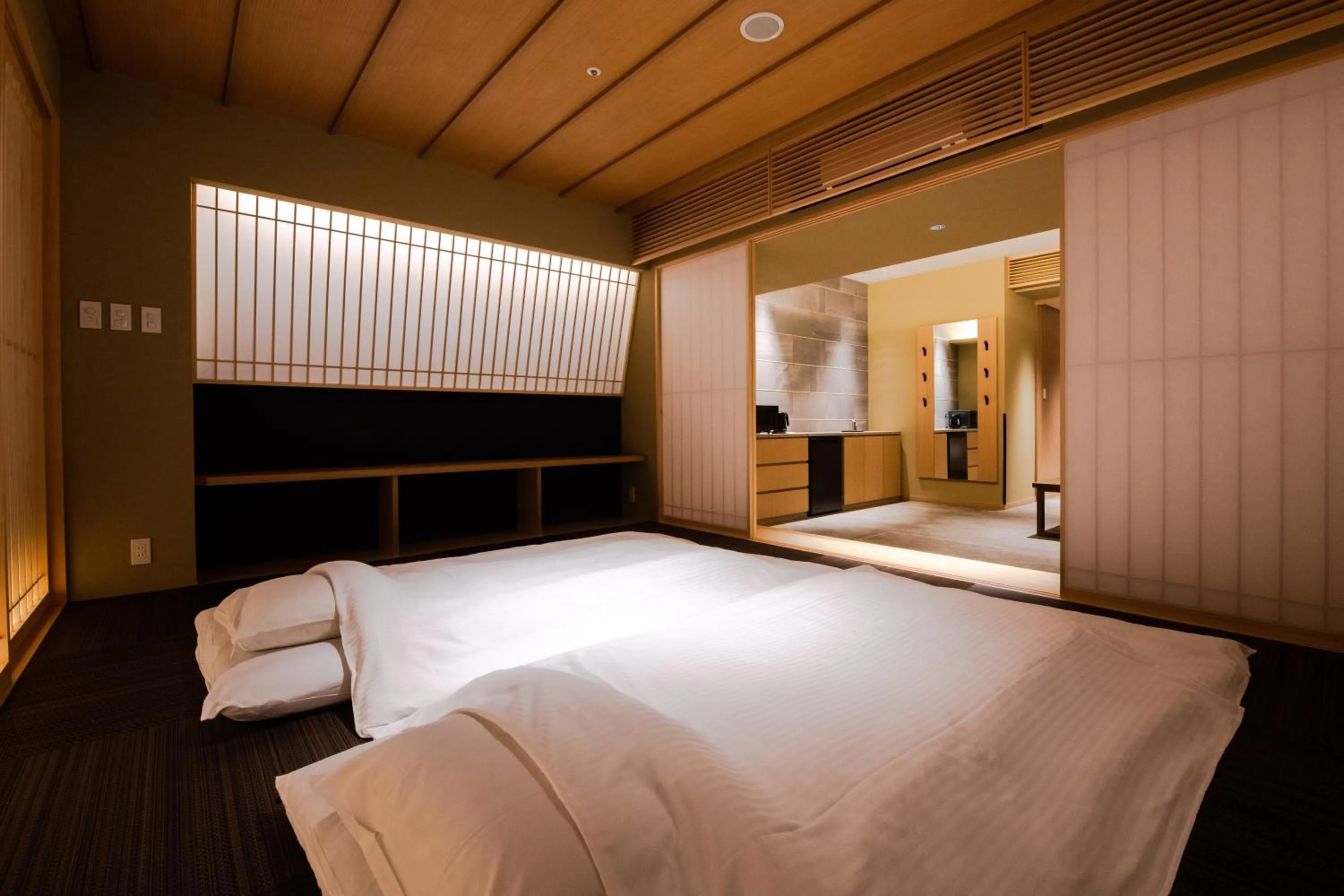 Bed in GuestHouse MIYABI Premium