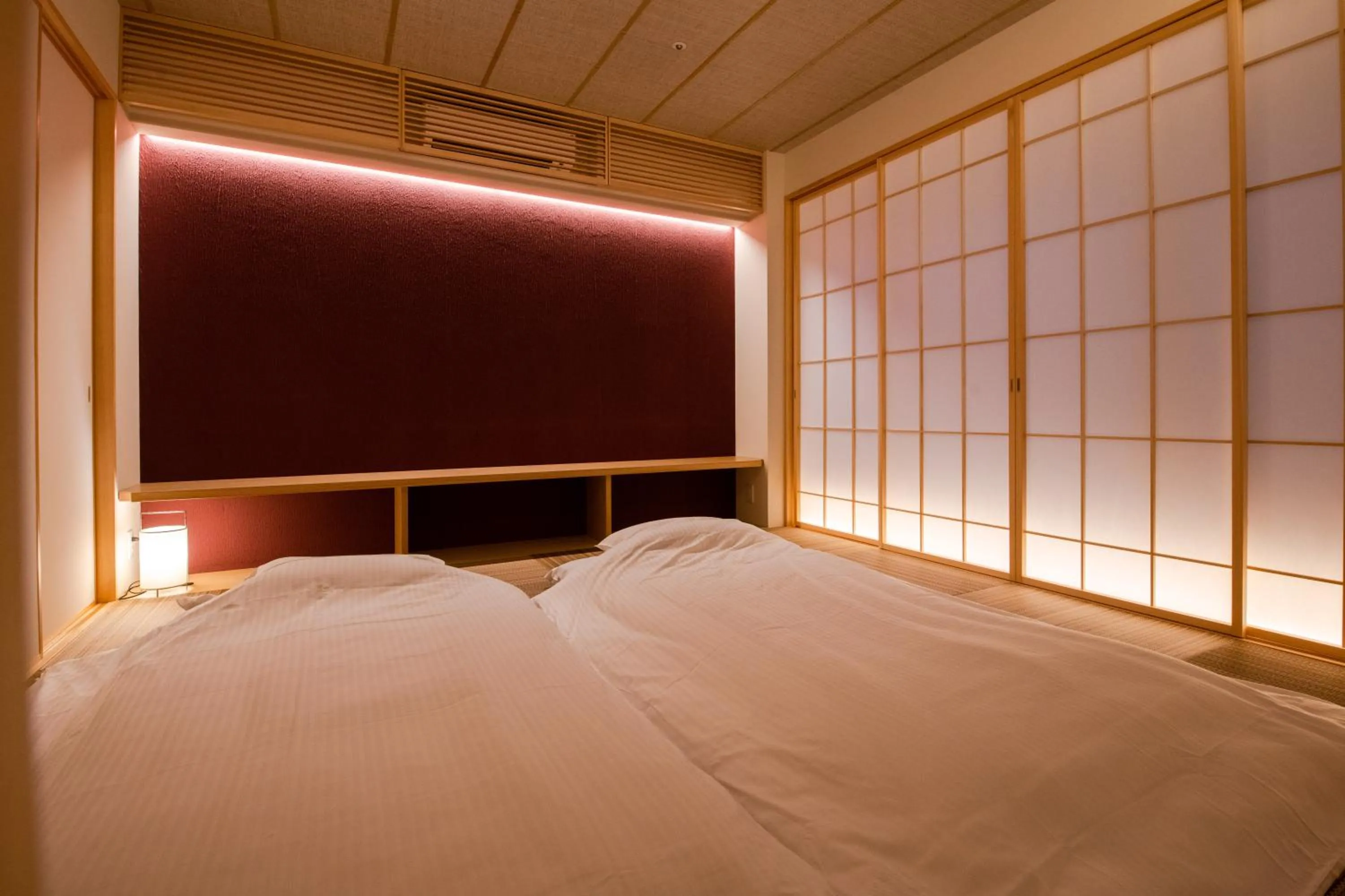 Bed in GuestHouse MIYABI Premium