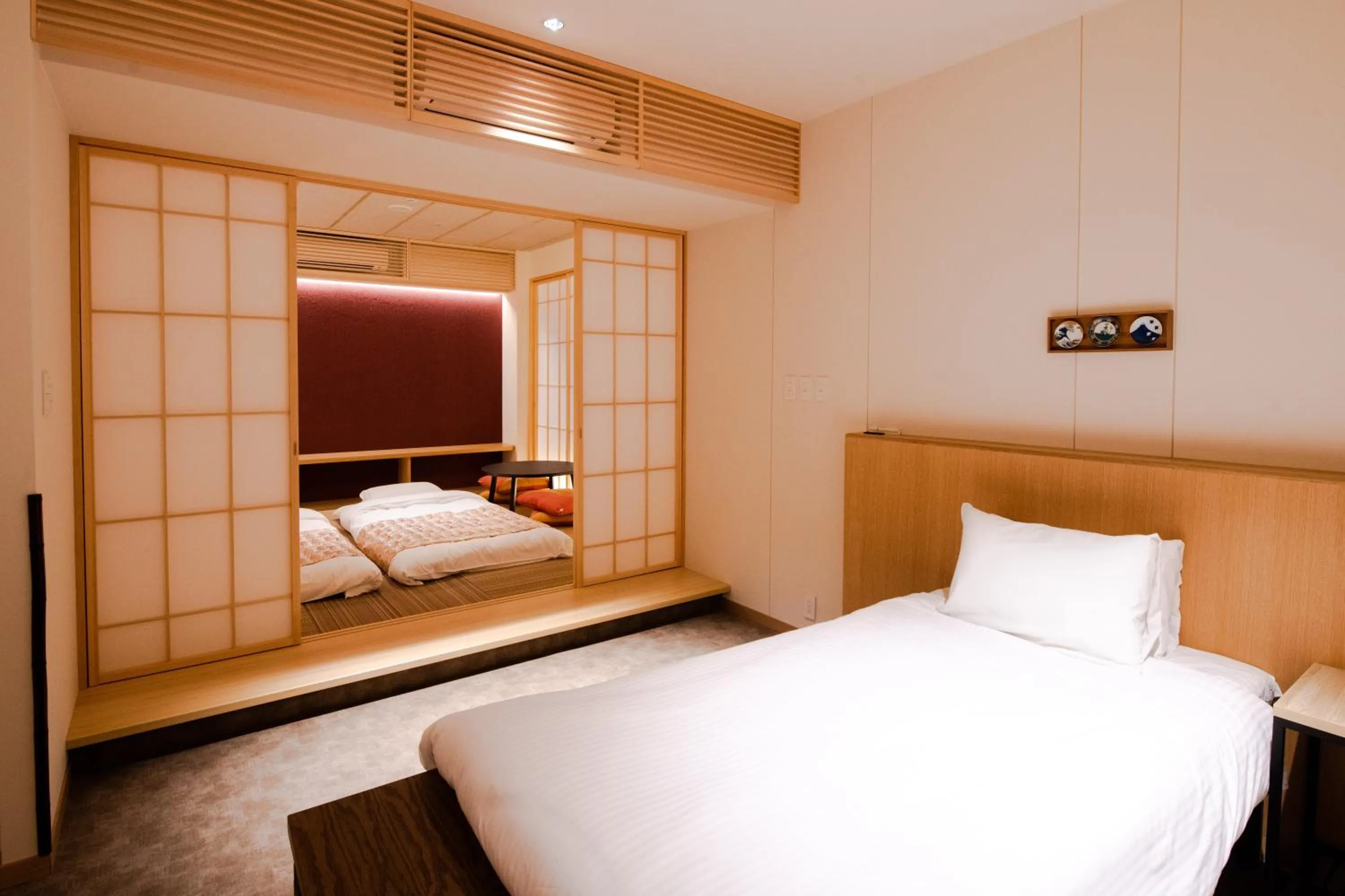 Bed in GuestHouse MIYABI Premium