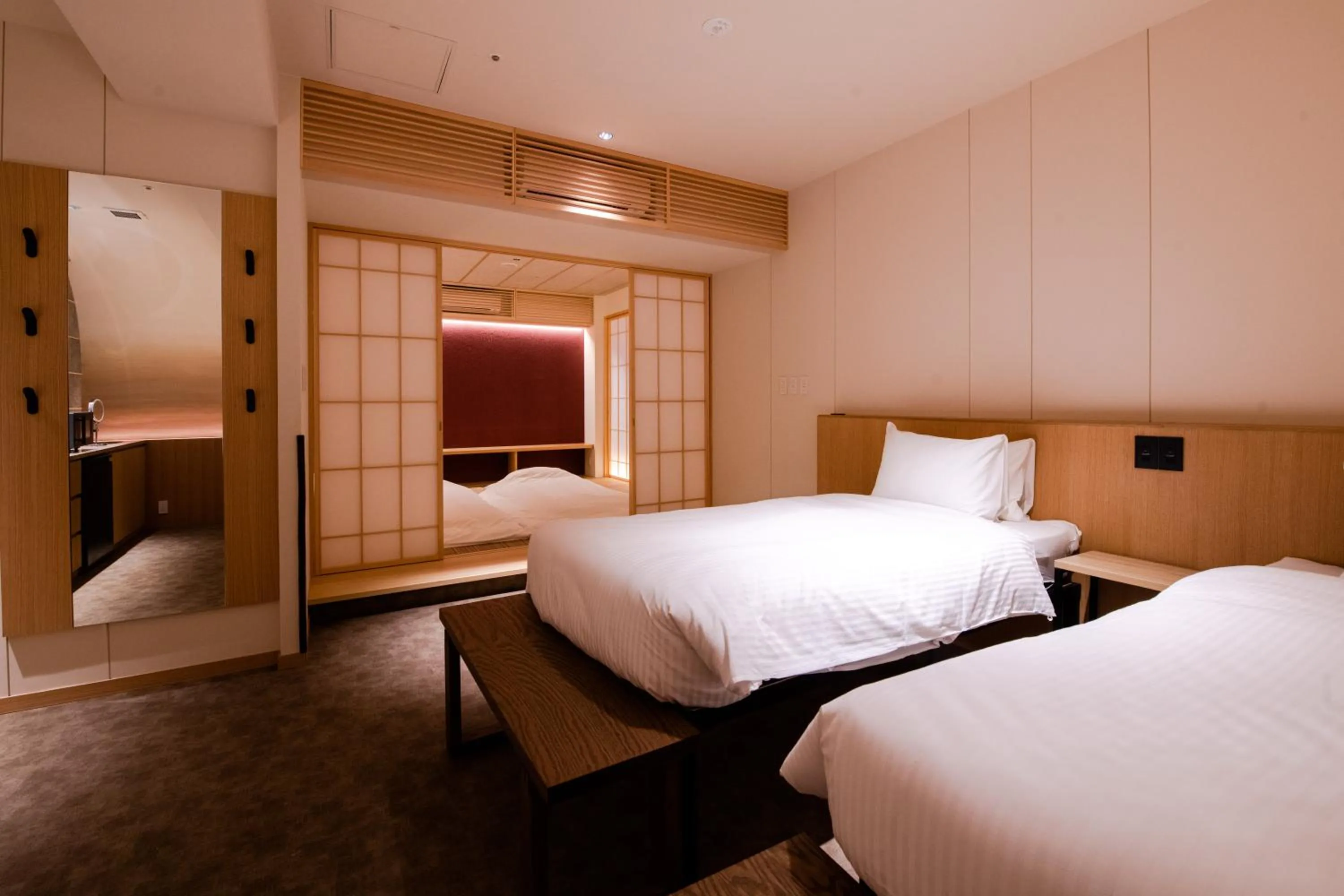 Bed in GuestHouse MIYABI Premium