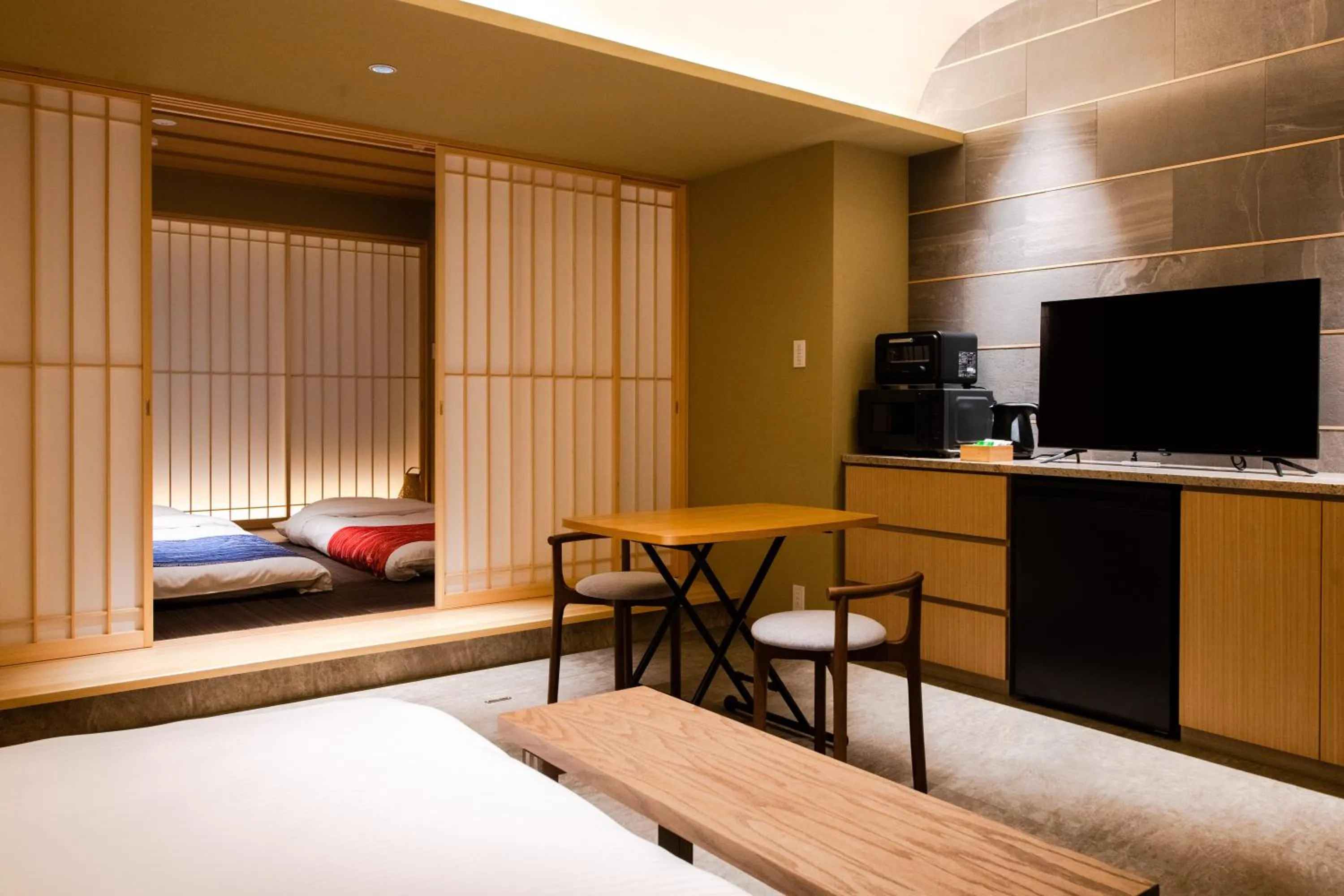 Bed in GuestHouse MIYABI Premium