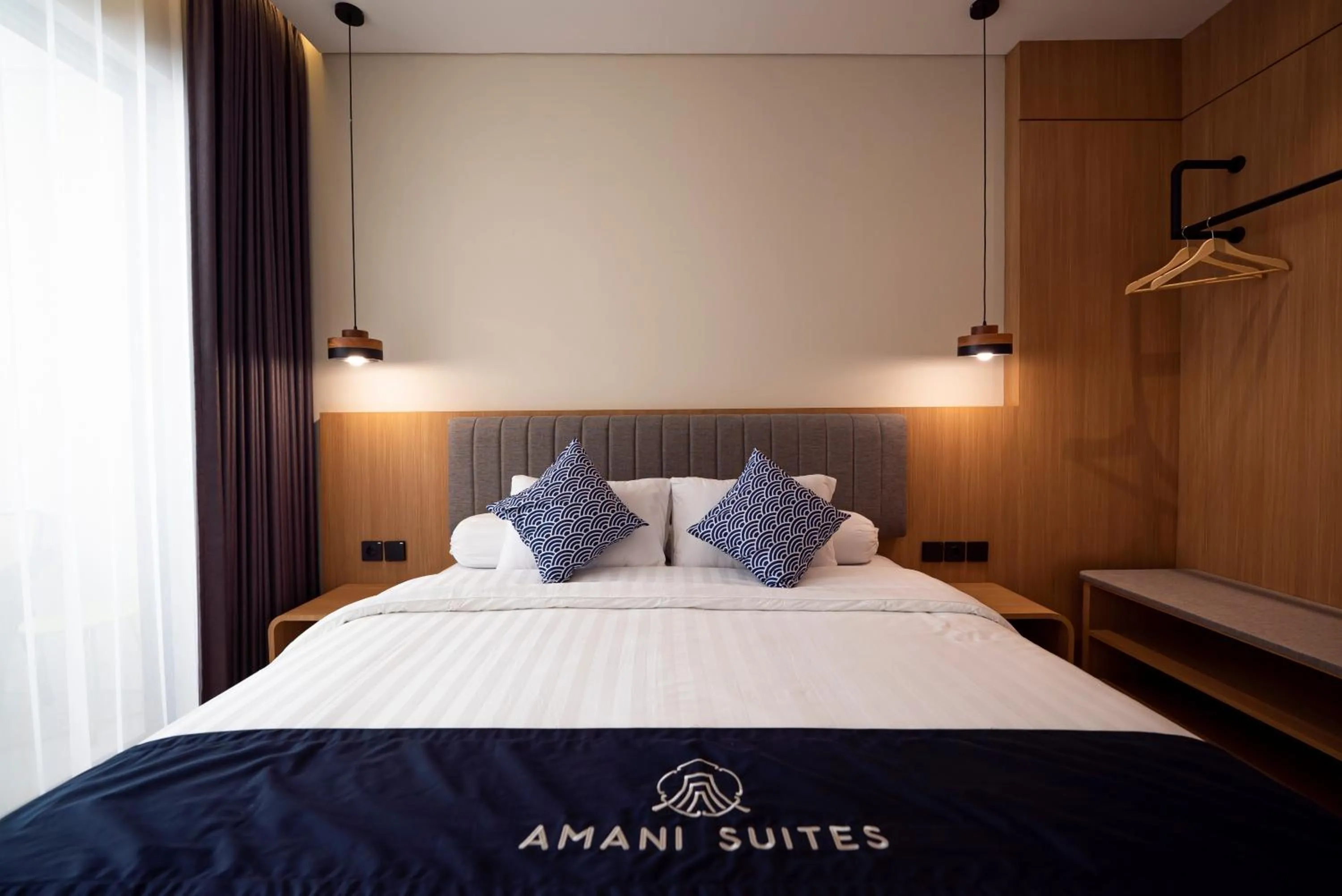 Bed in Amani Suites Yogyakarta