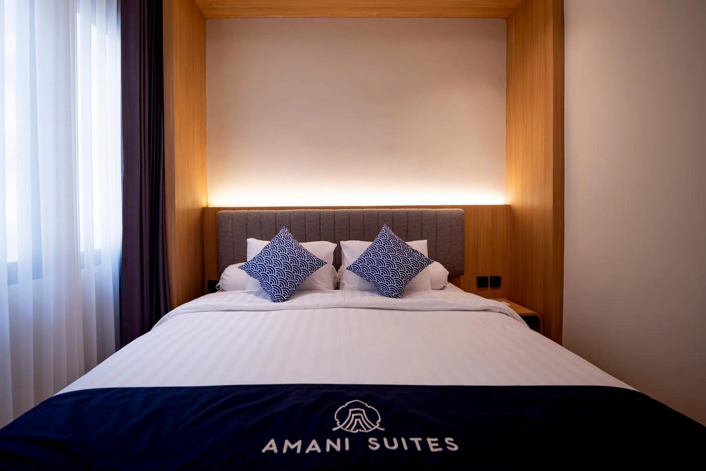 Bed in Amani Suites Yogyakarta