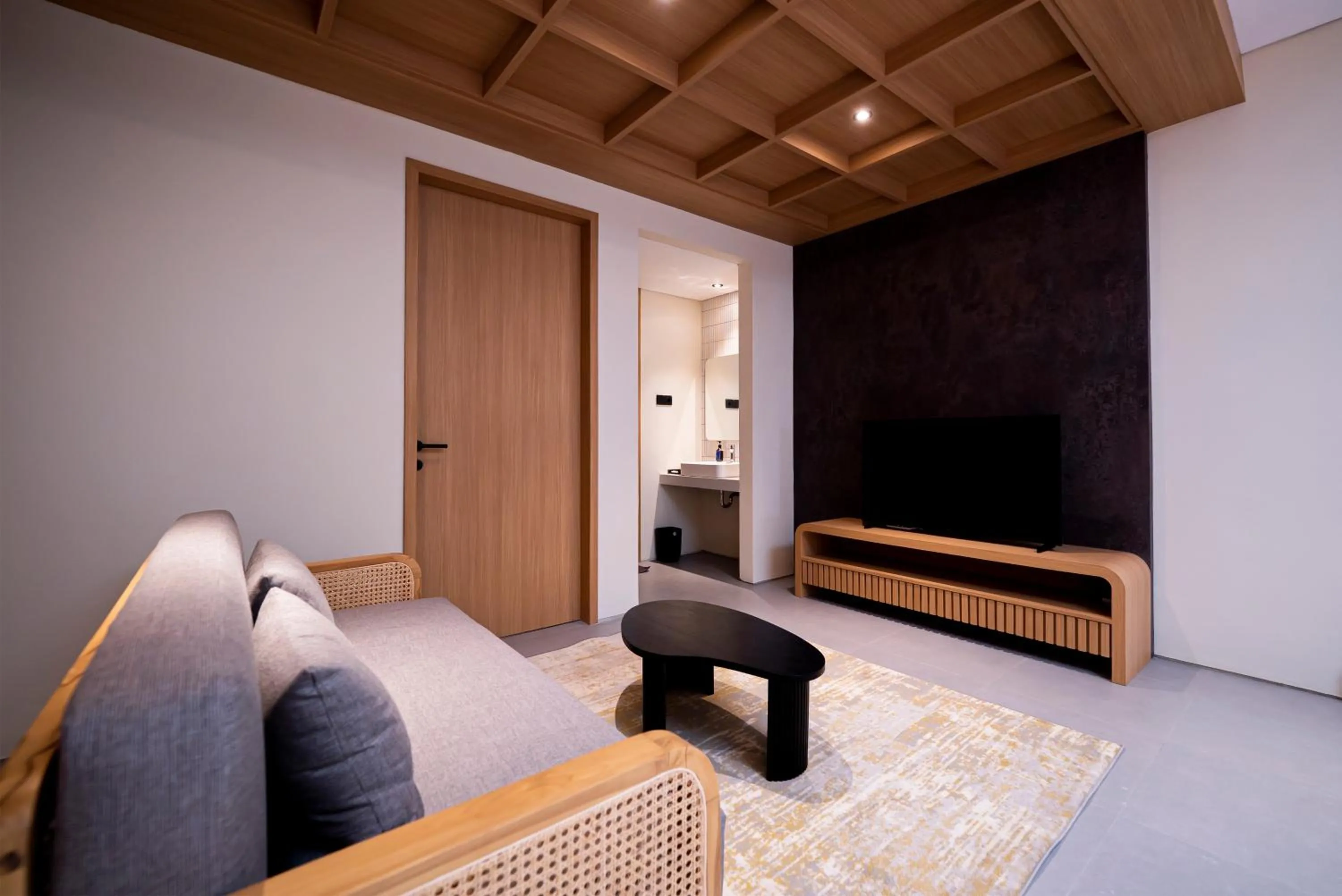 Bed in Amani Suites Yogyakarta