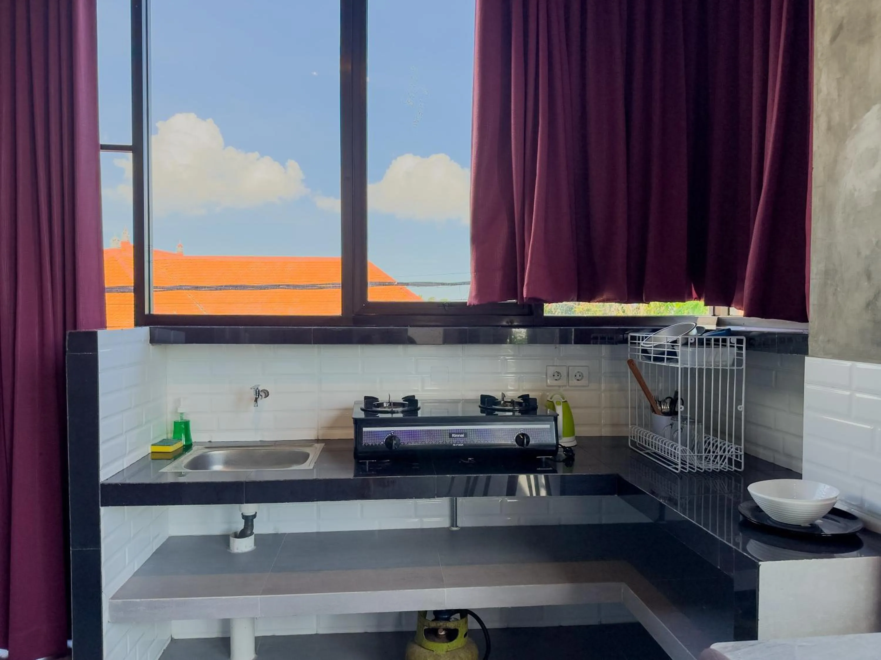 Kitchen or kitchenette in Sky Apartments and Suites