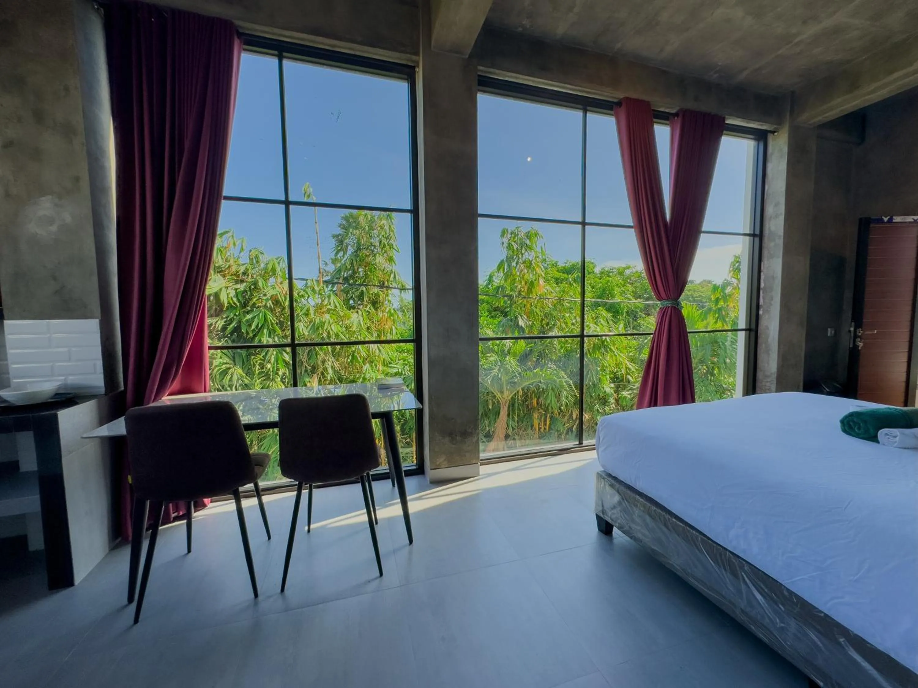 Bed in Sky Apartments and Suites