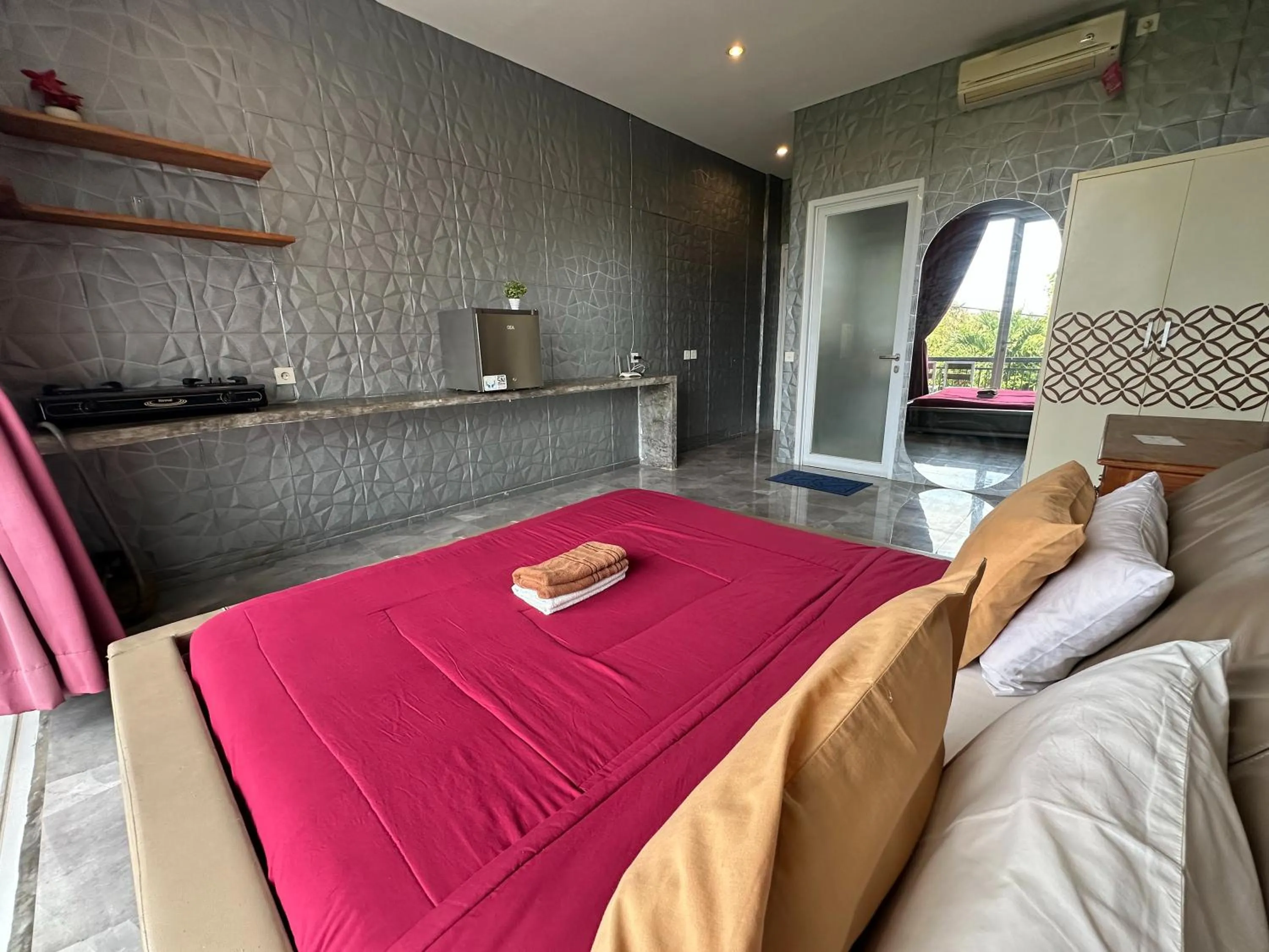 Bed in Sky Apartments and Suites