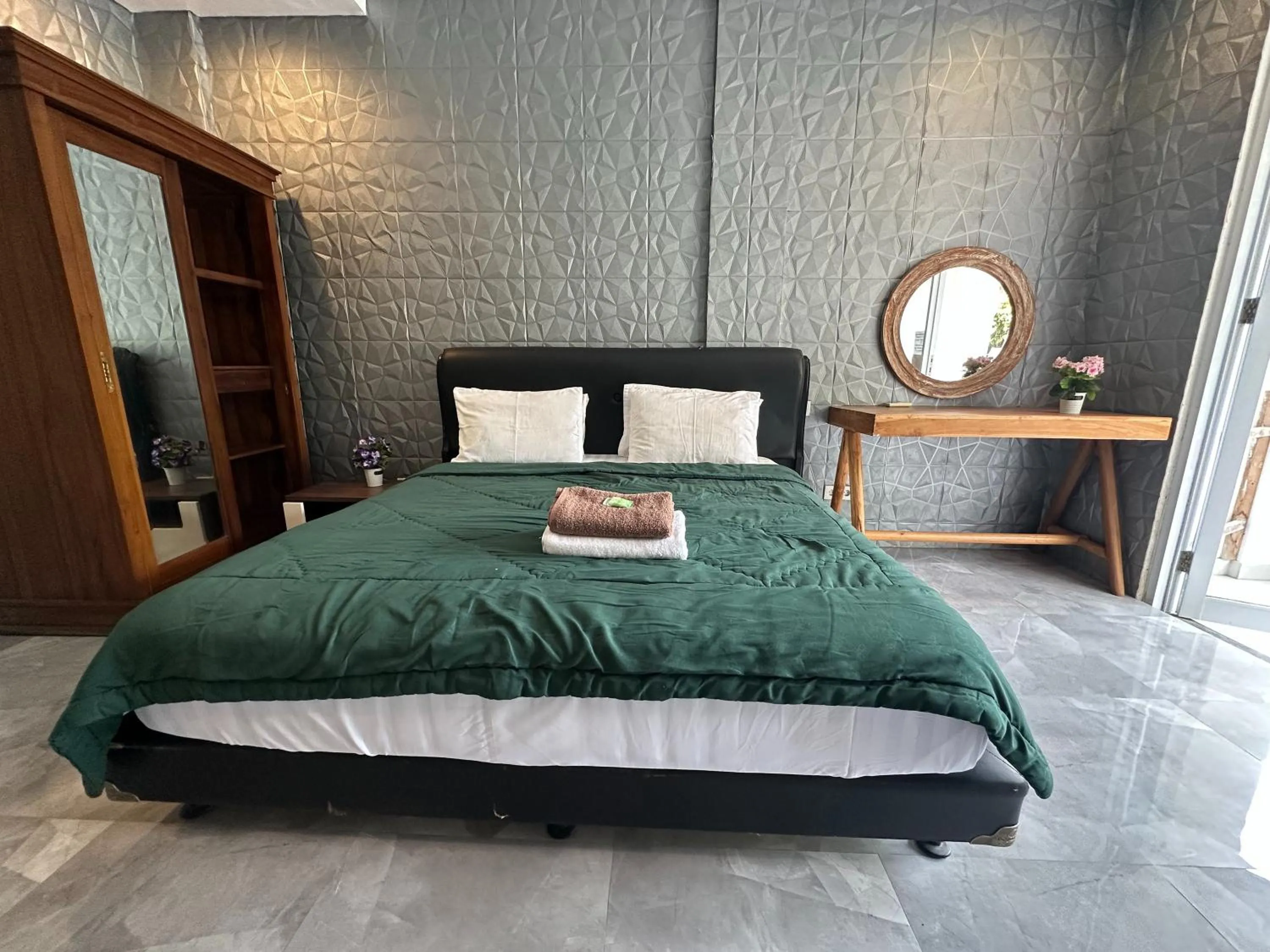 Bed in Sky Apartments and Suites