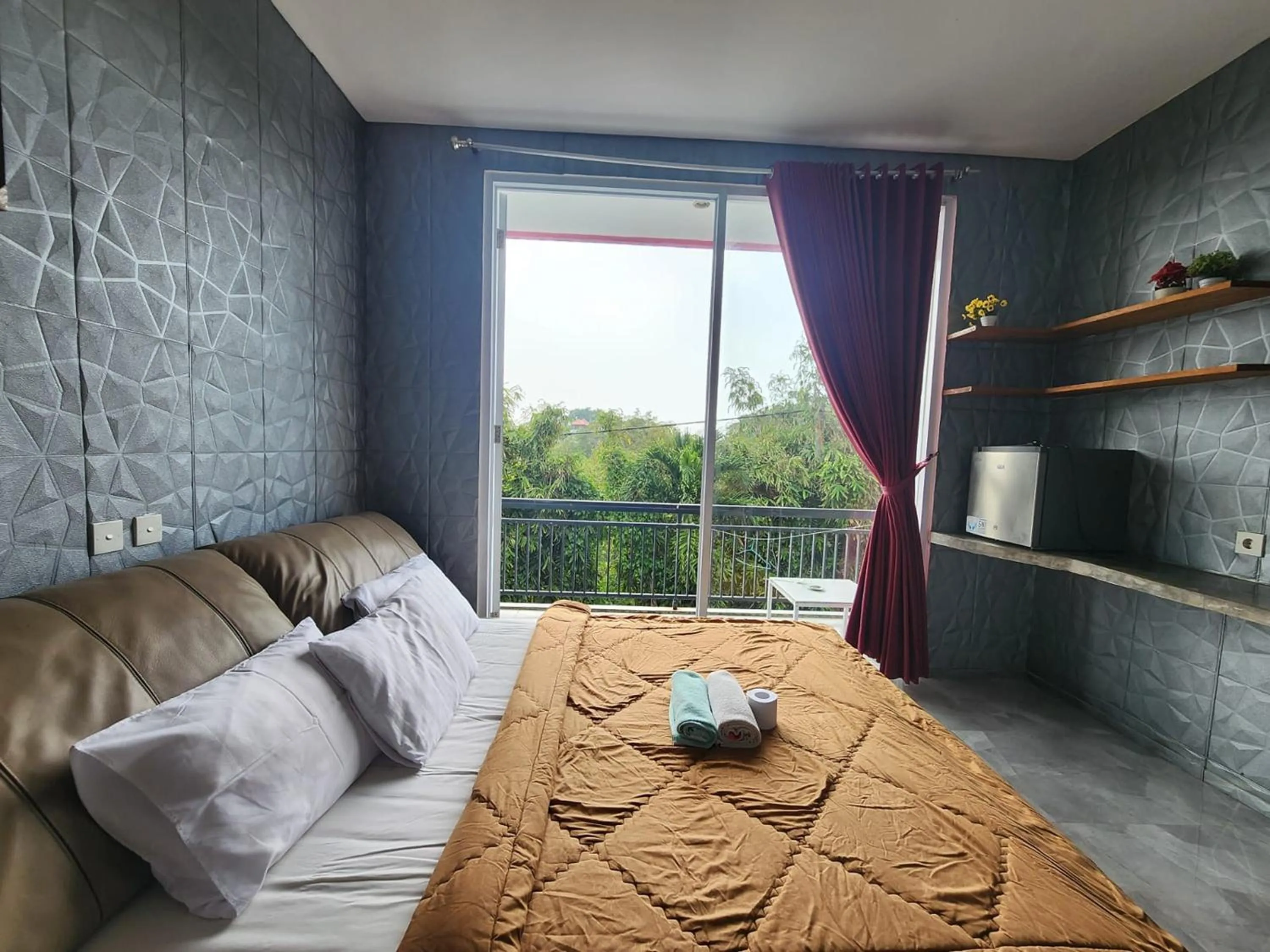 Bed in Sky Apartments and Suites