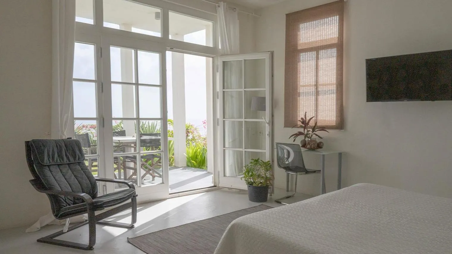 Bed in Whale Tails Island Suites & Villas