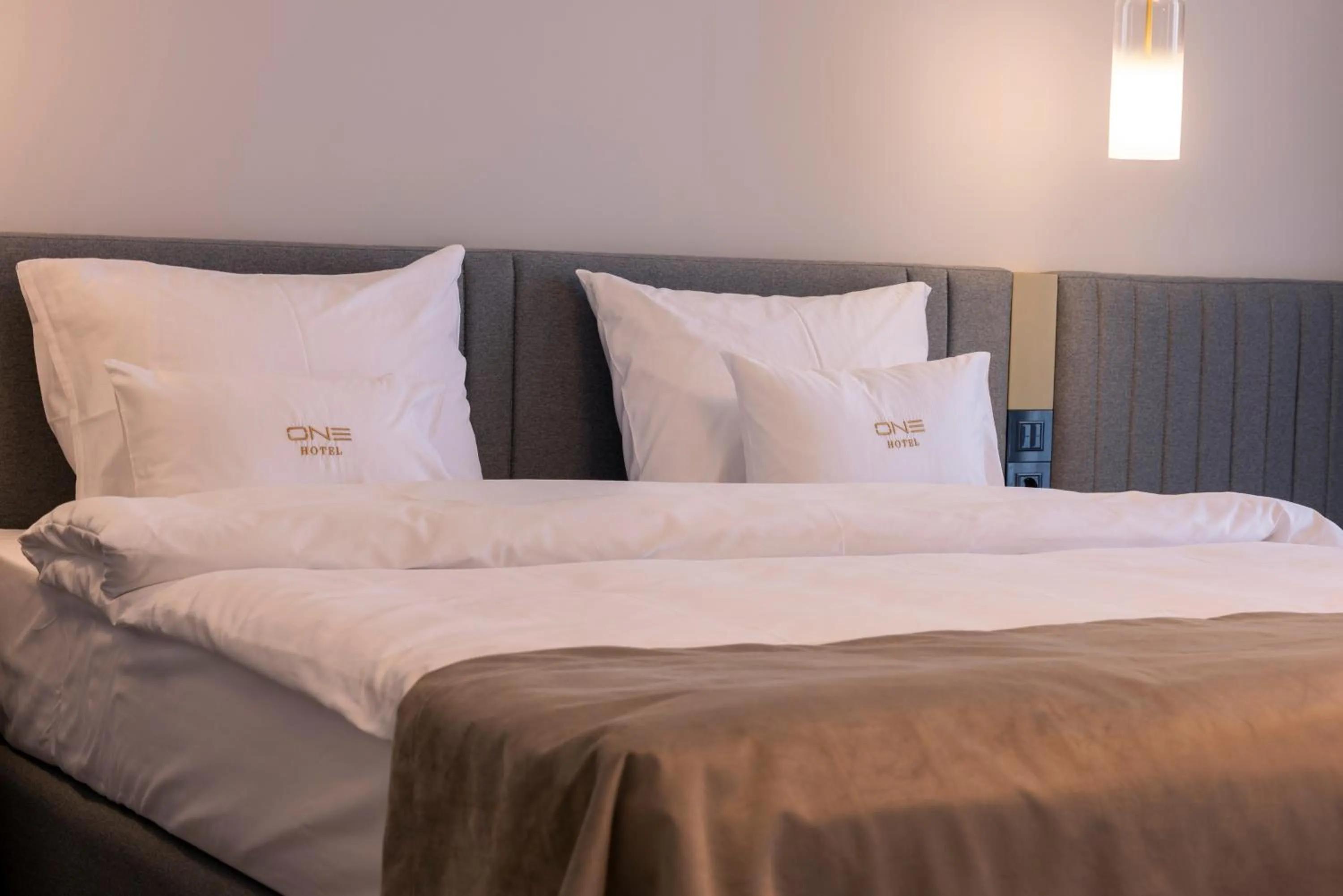 Bed in ONE Hotel