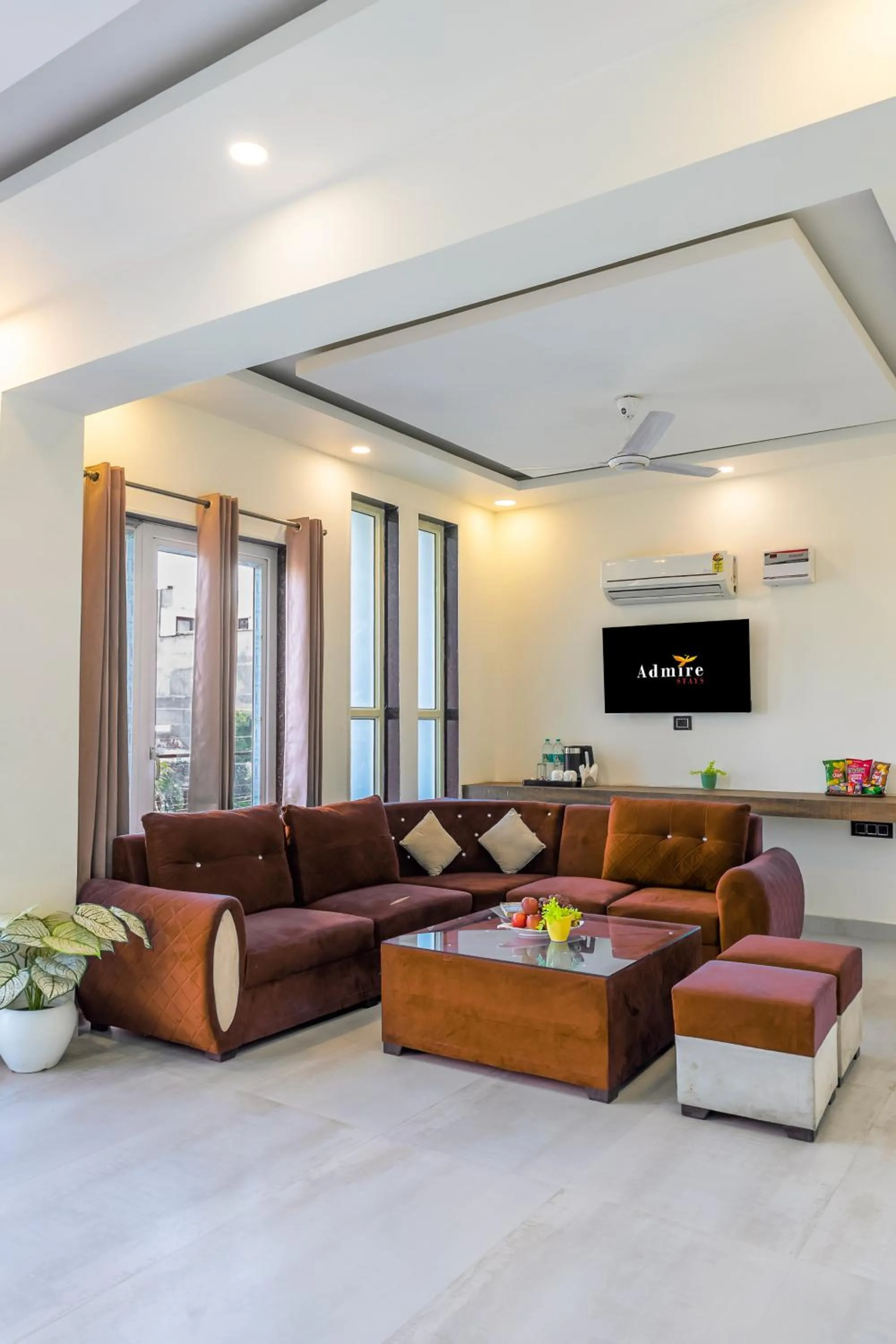 Communal lounge/ TV room in The Metro Stay by ASPL