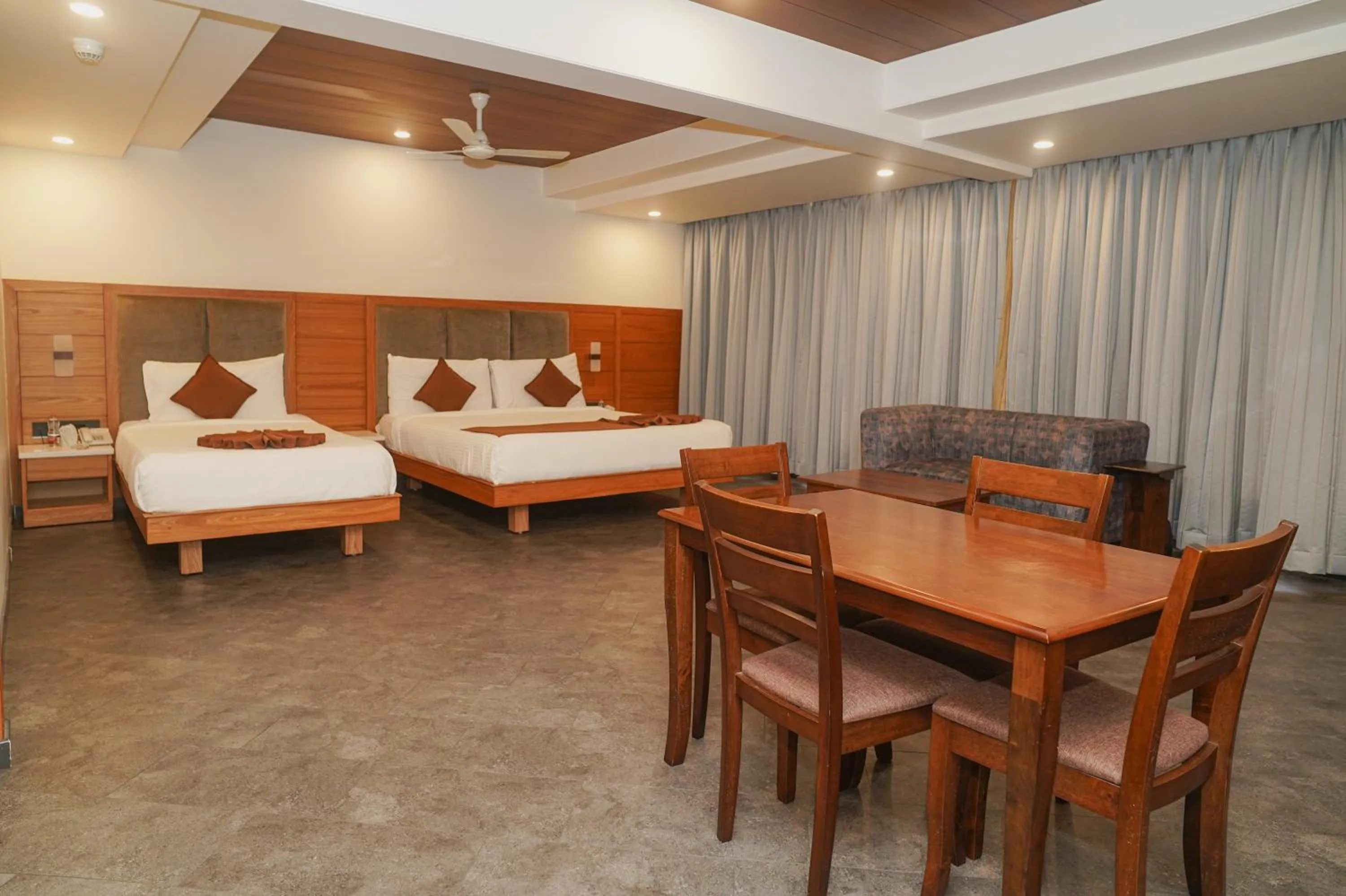 Photo of the whole room, Bed in Royal Ritis Hubballi