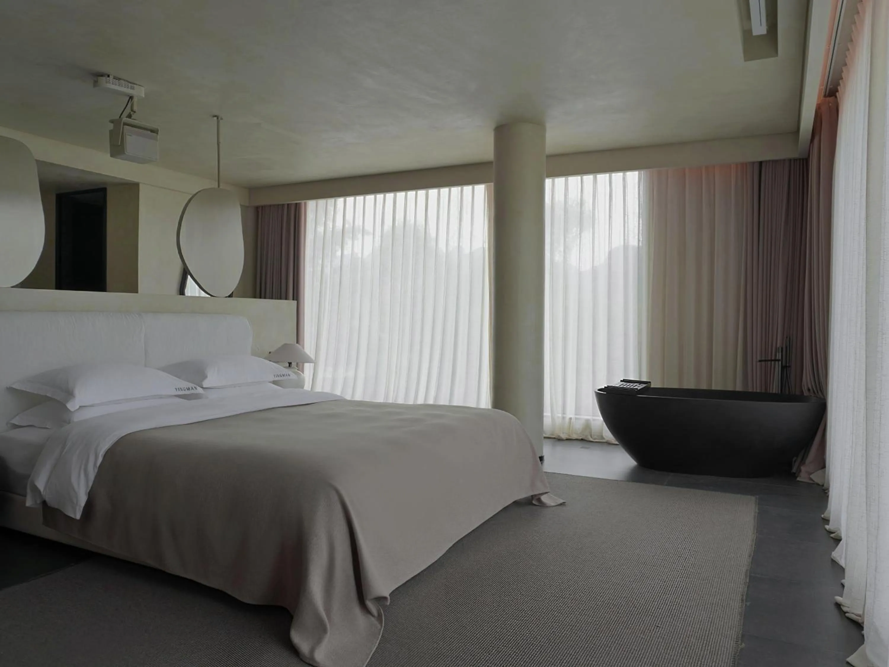 Bed in YINGMAN HOTEL