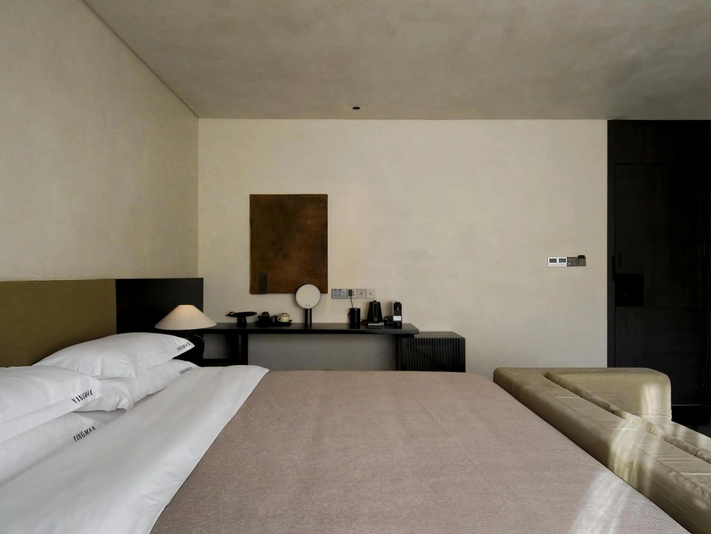 Bed in YINGMAN HOTEL