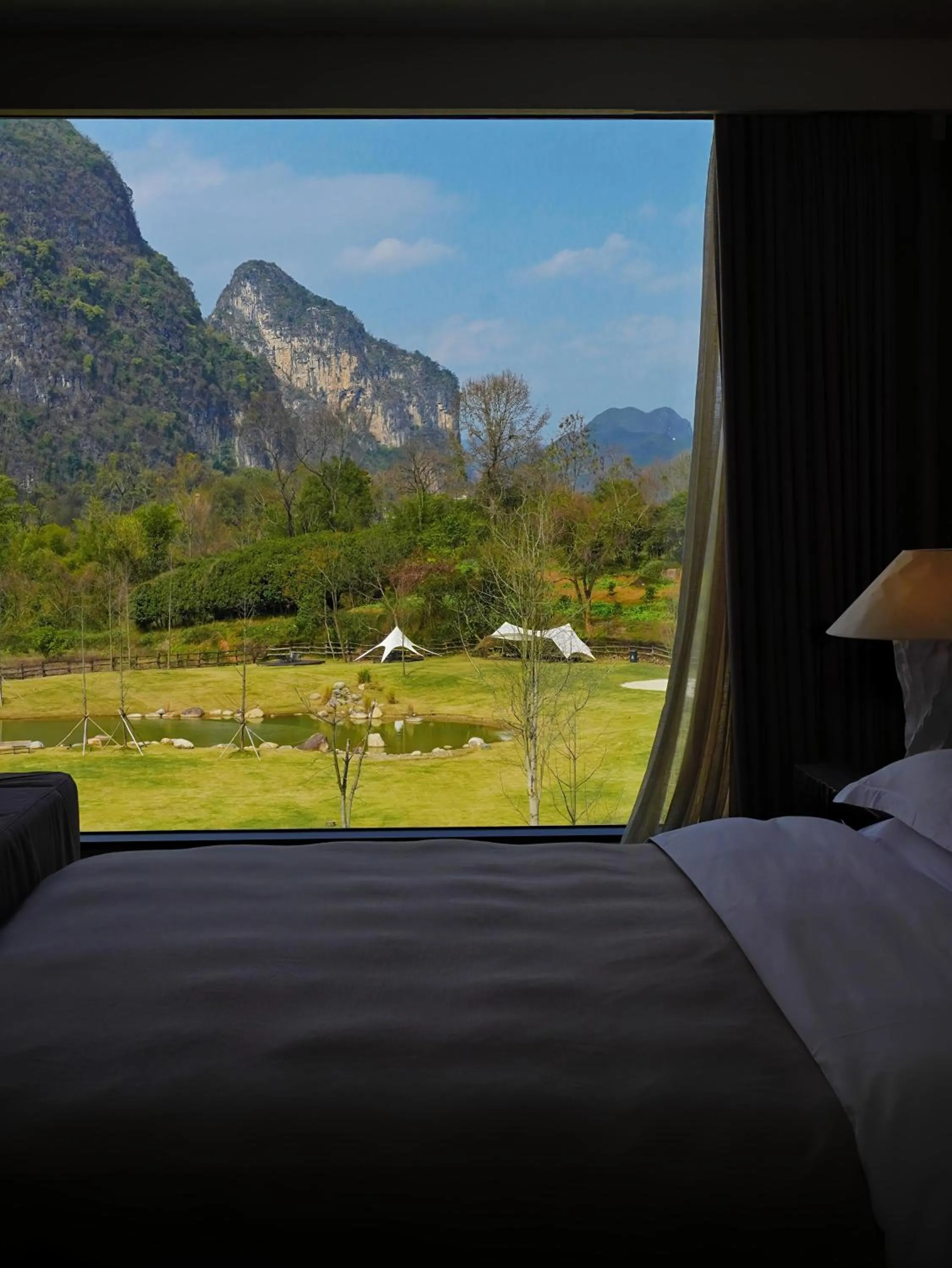 Bed in YINGMAN HOTEL