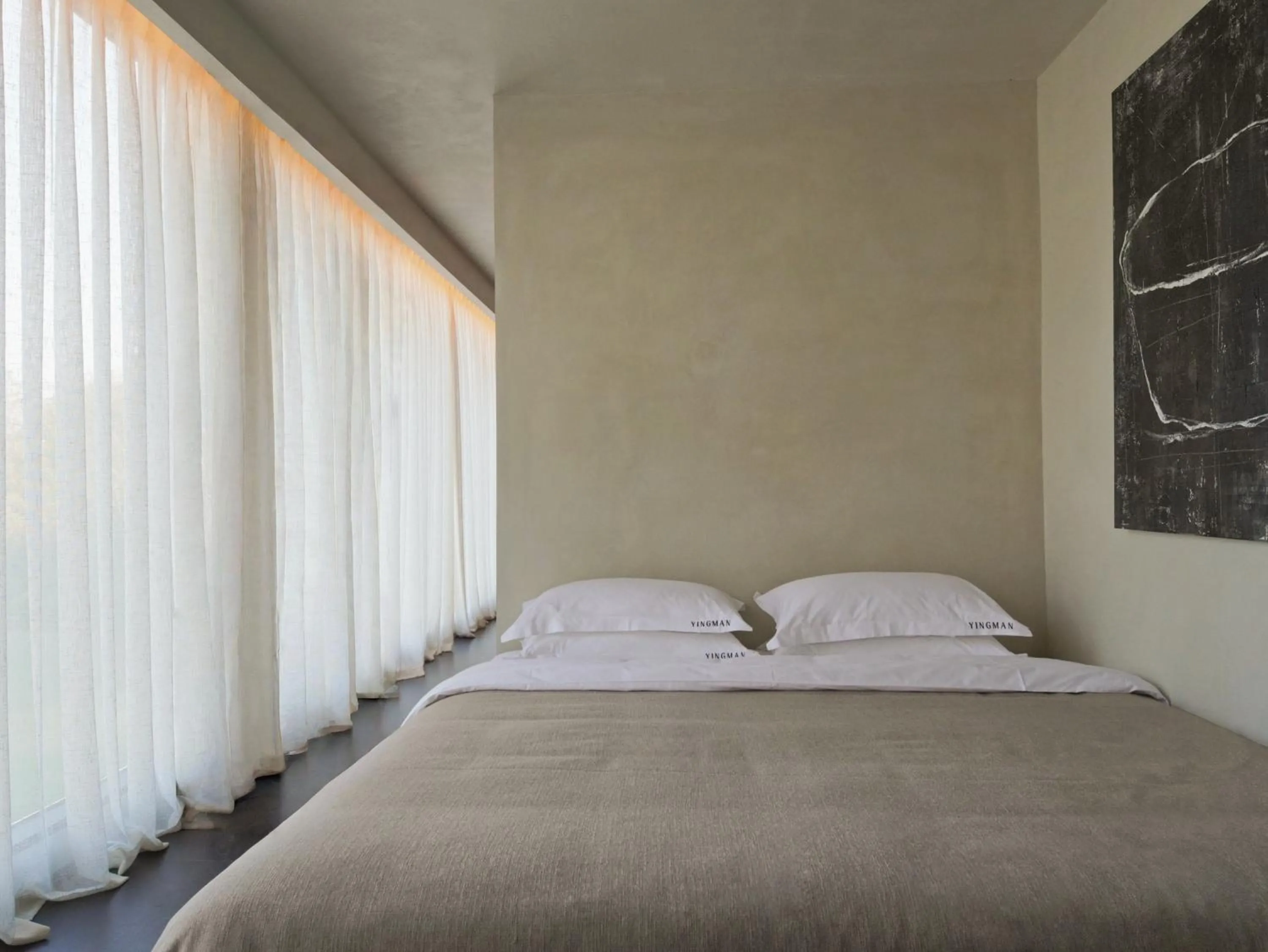 Bed in YINGMAN HOTEL
