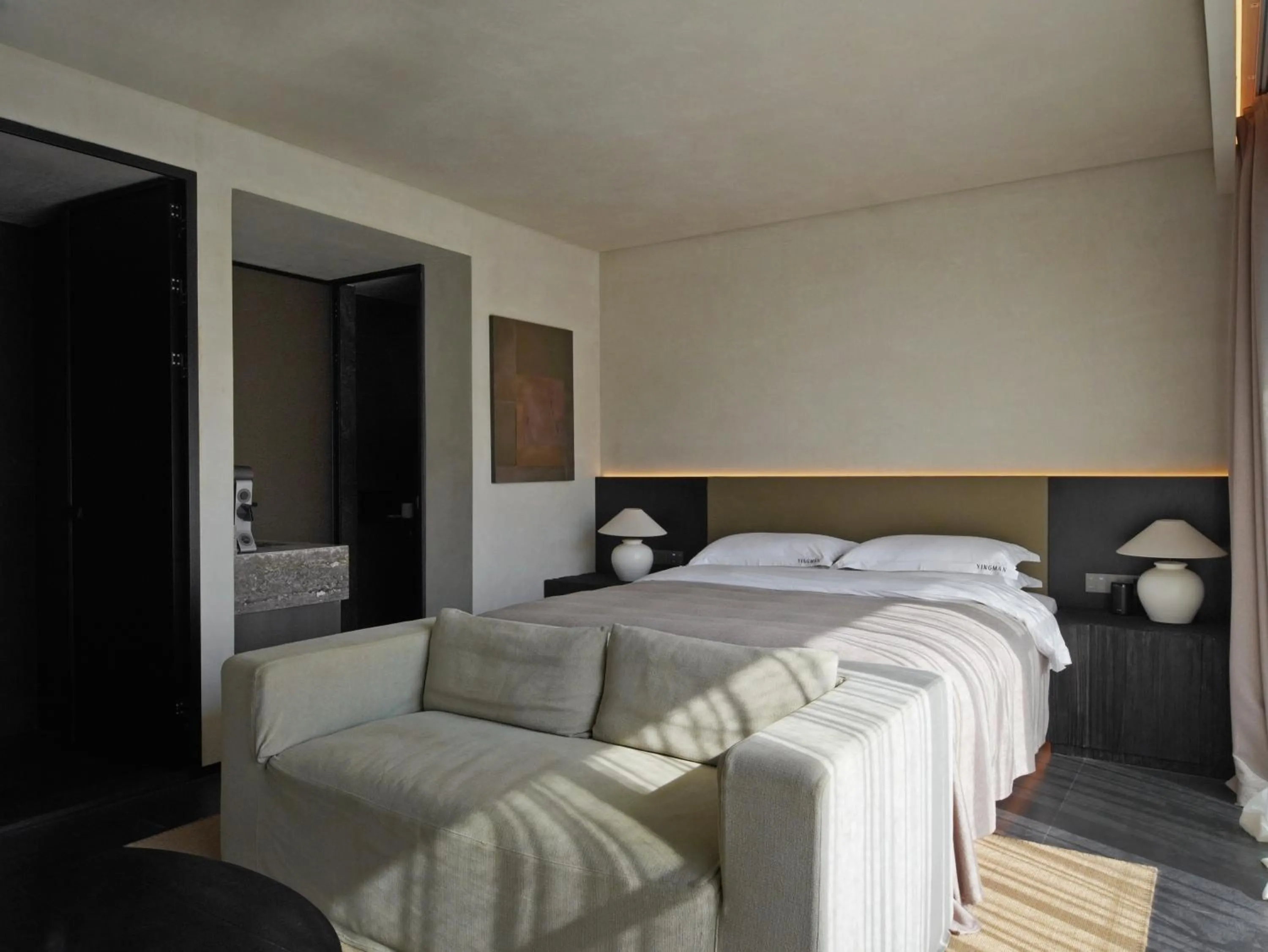 Bed in YINGMAN HOTEL