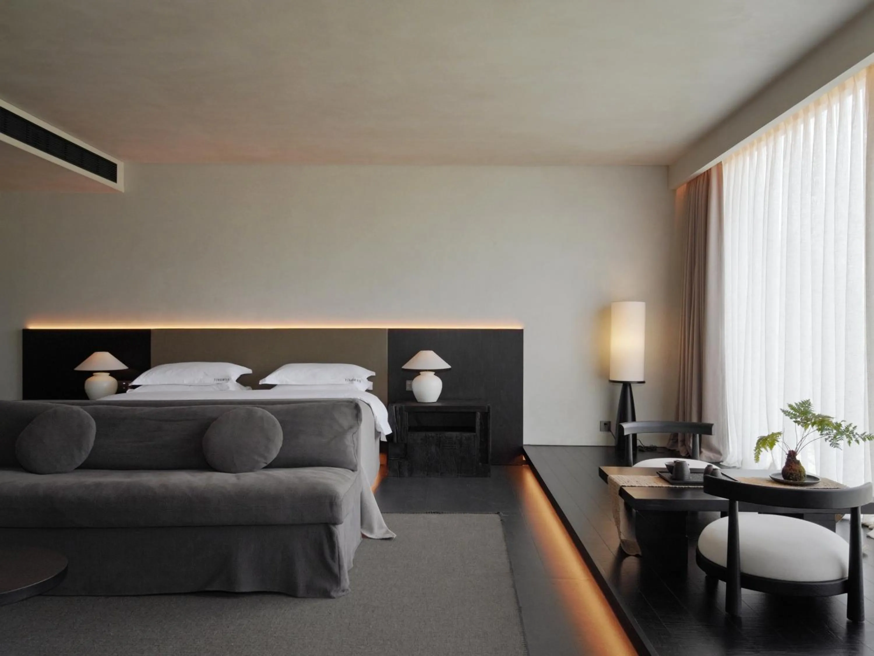 Bed in YINGMAN HOTEL