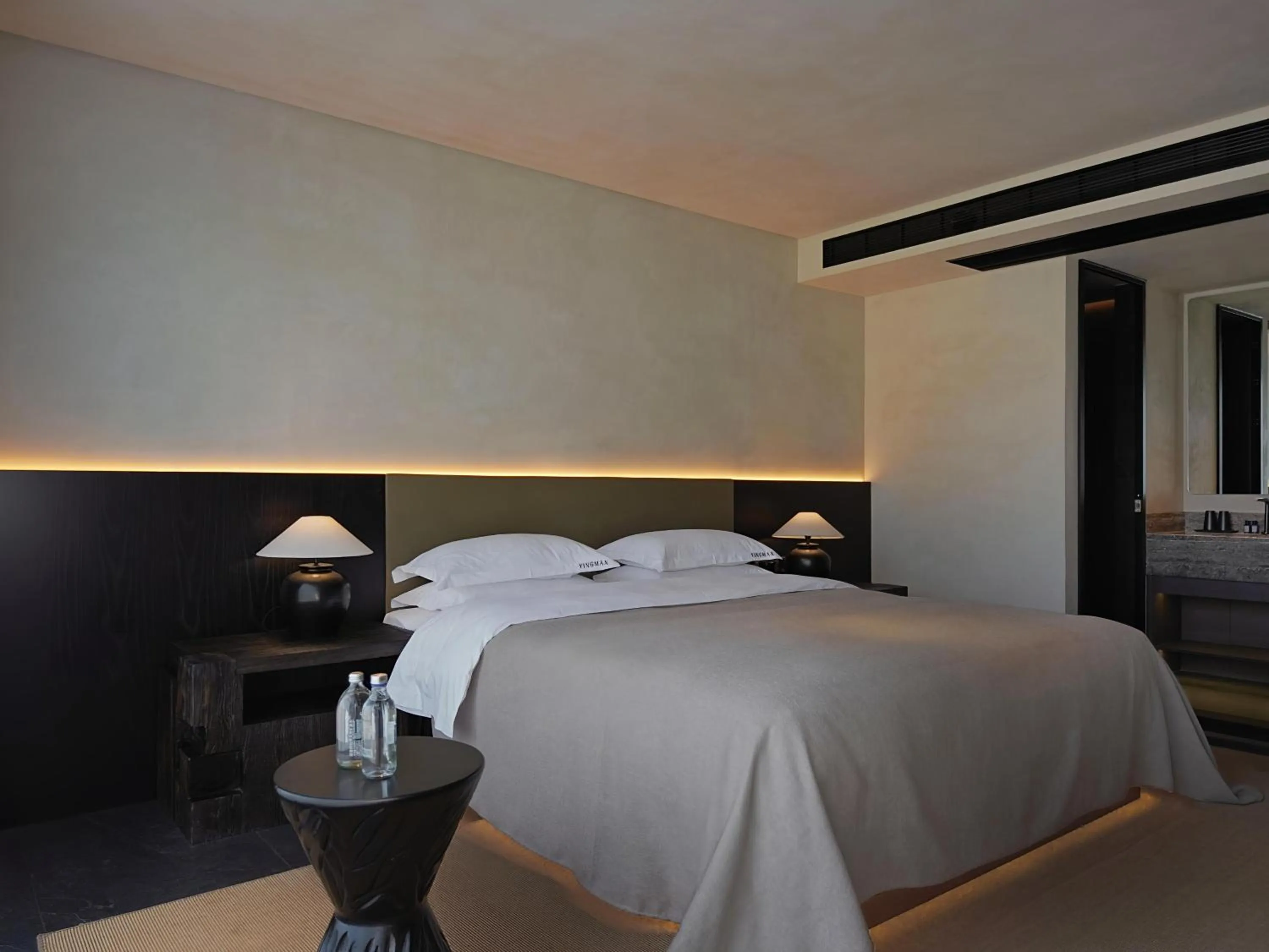 Bed in YINGMAN HOTEL