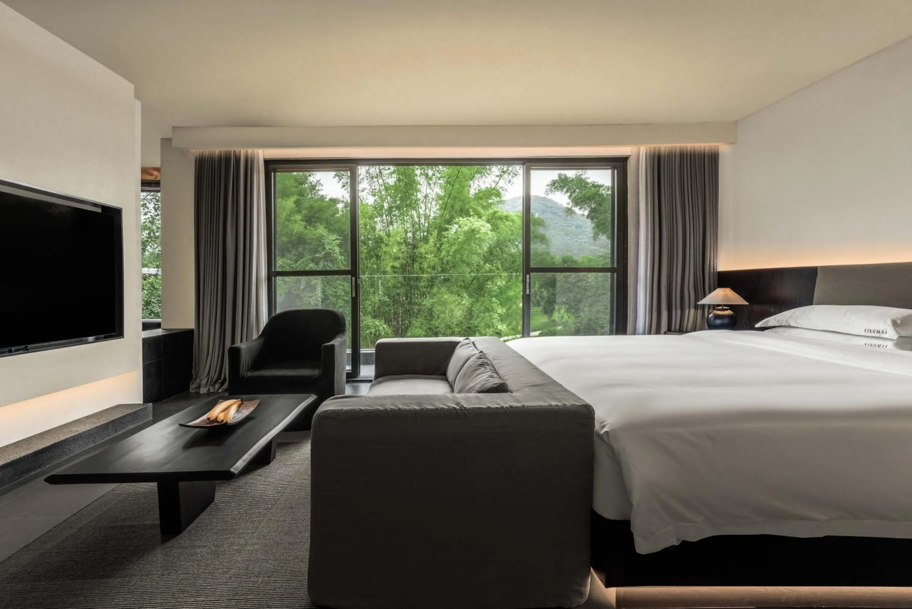 Bed in YINGMAN HOTEL