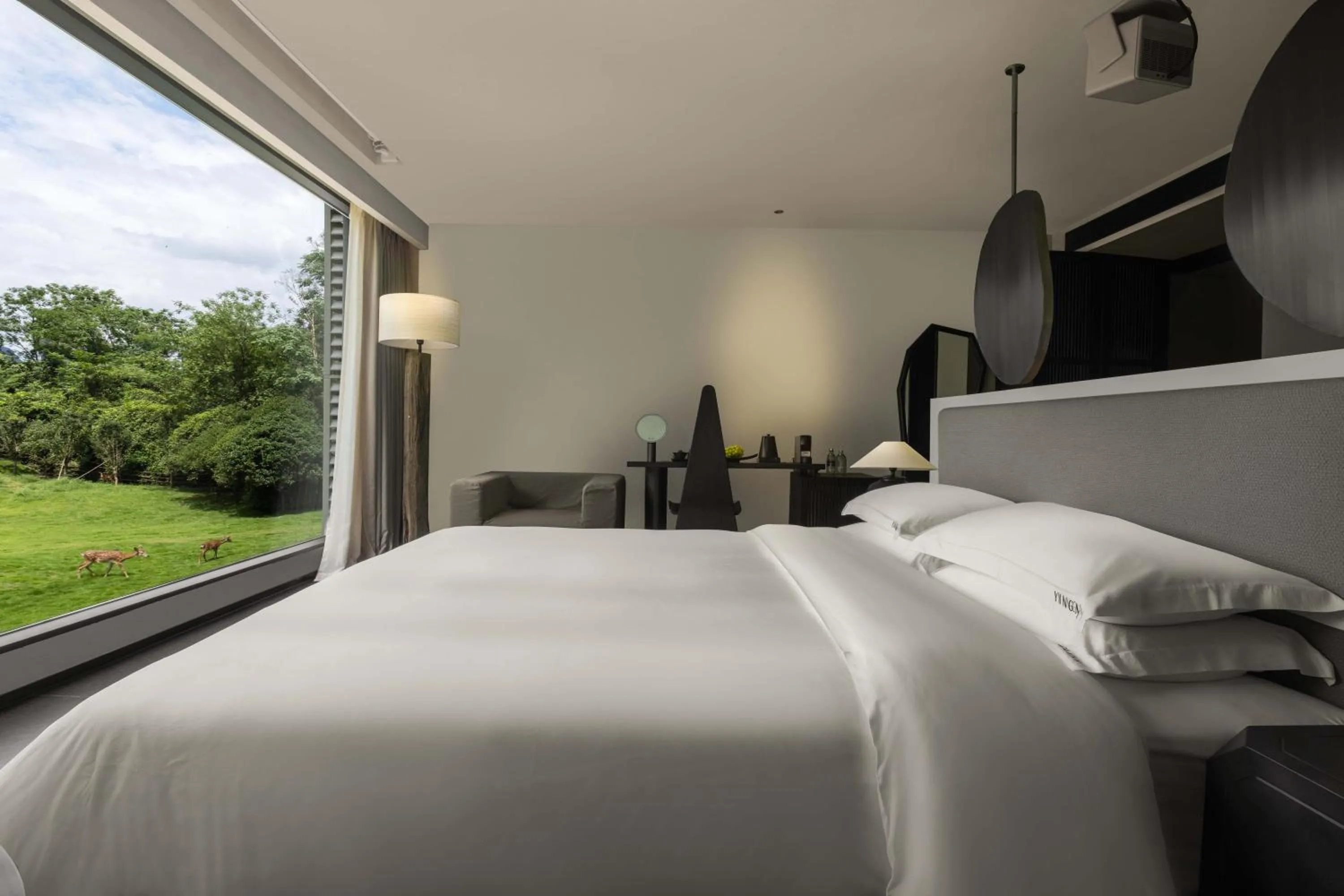 Bed in YINGMAN HOTEL
