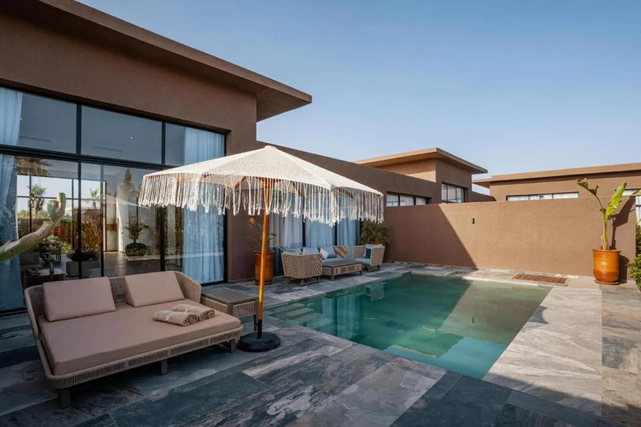 NOMMOS Beach RESORT & POOL CLUB