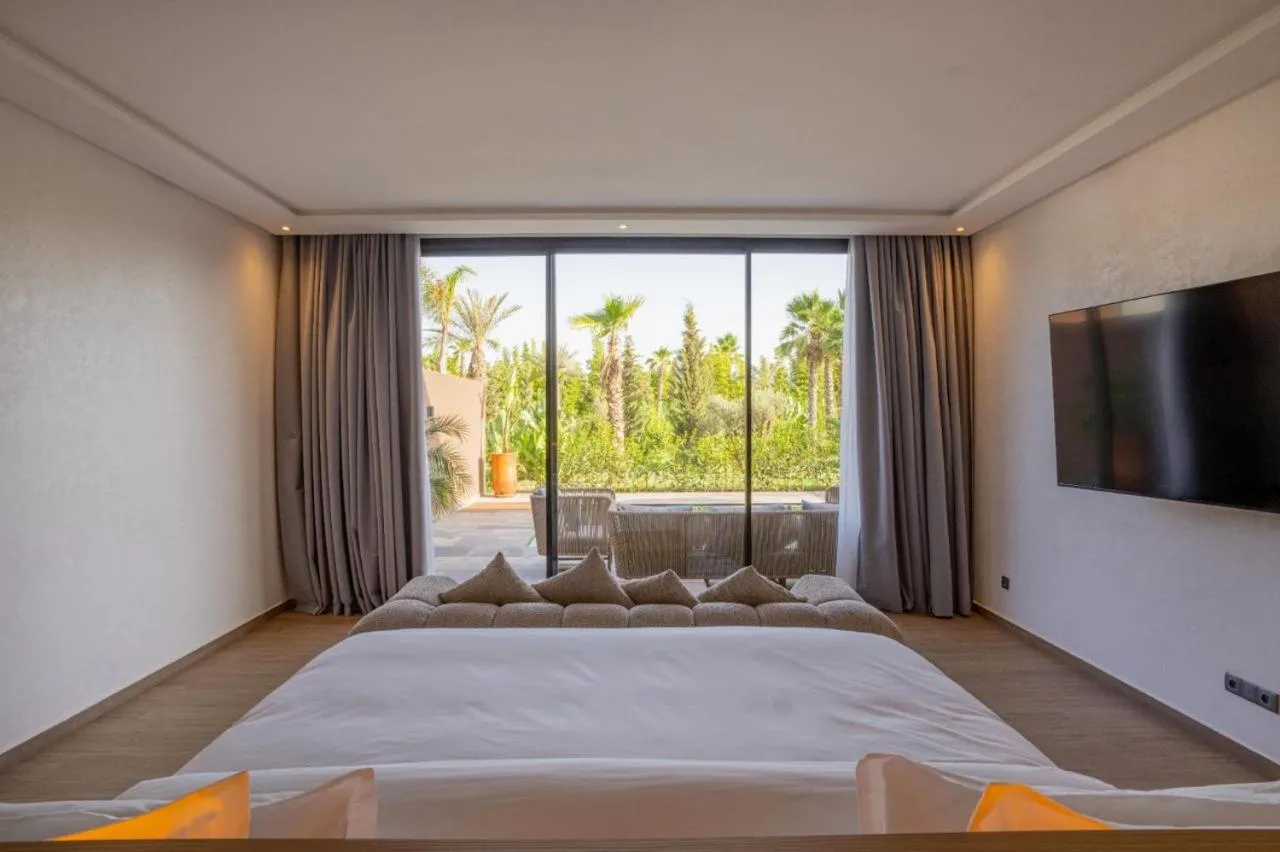 Bed in NOMMOS Beach RESORT & POOL CLUB