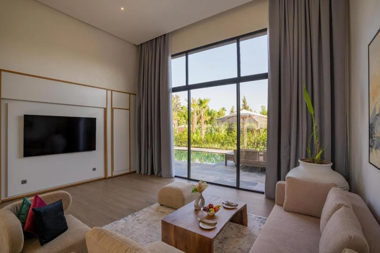 TV and multimedia in NOMMOS Beach RESORT & POOL CLUB