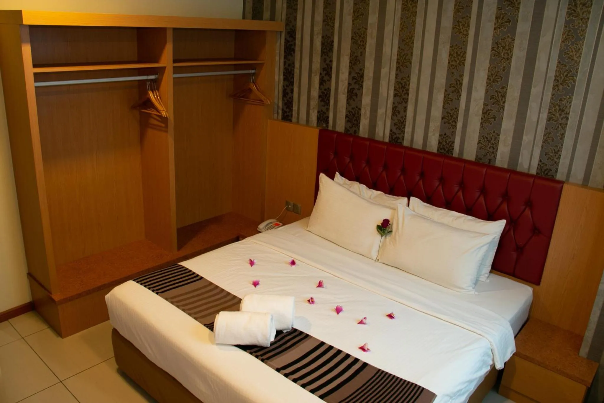 Bed in Prince 33 Hotel