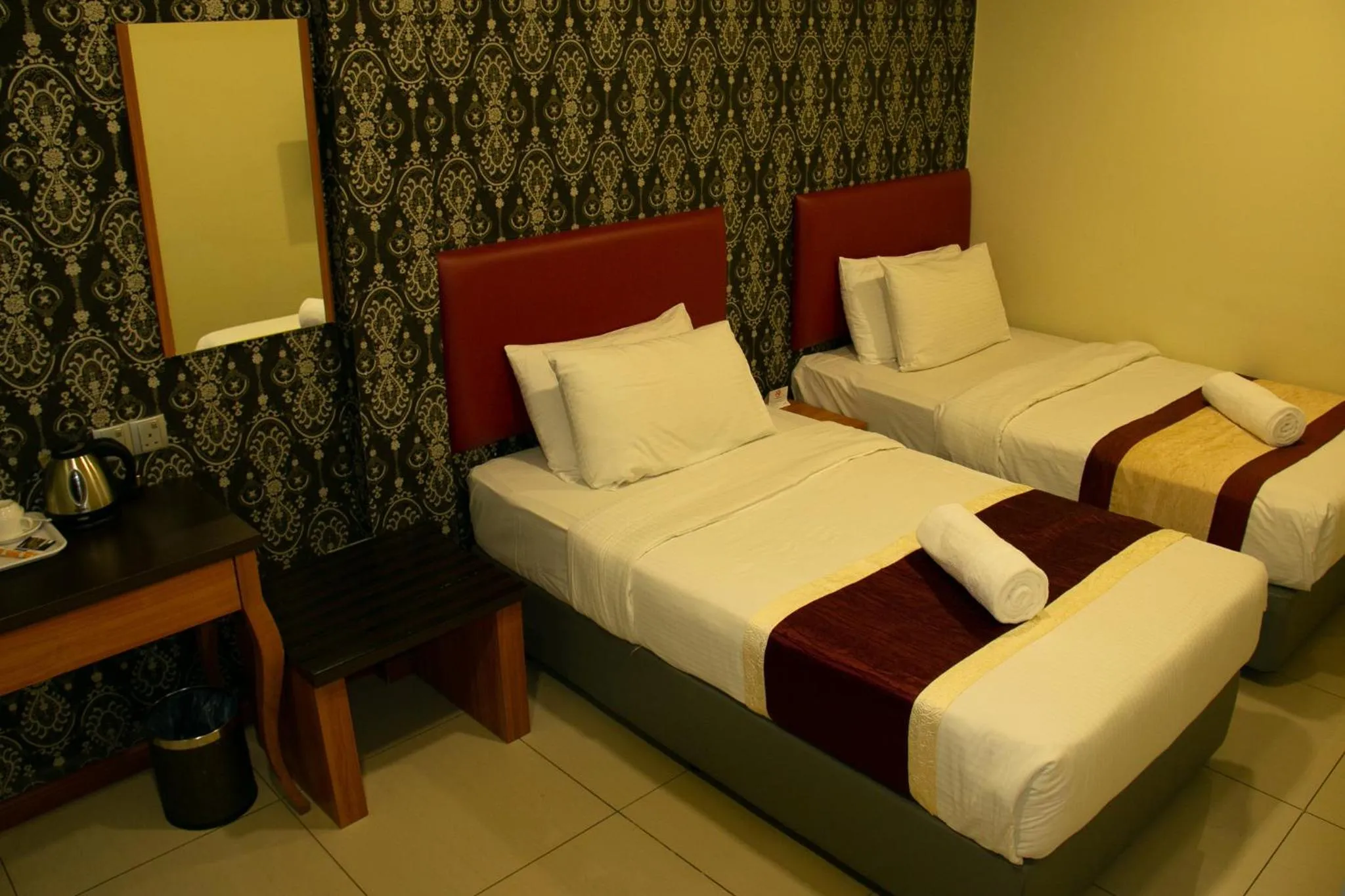 Bed in Prince 33 Hotel