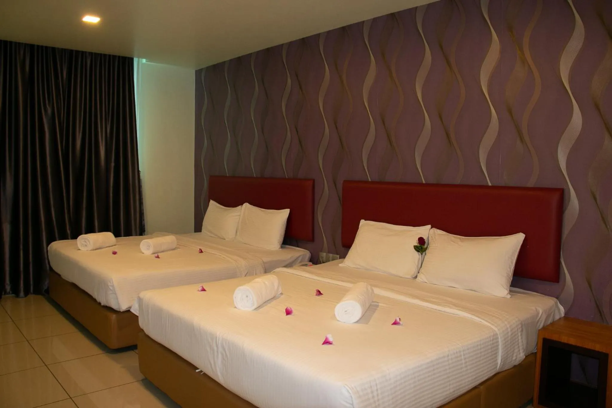 Bed in Prince 33 Hotel