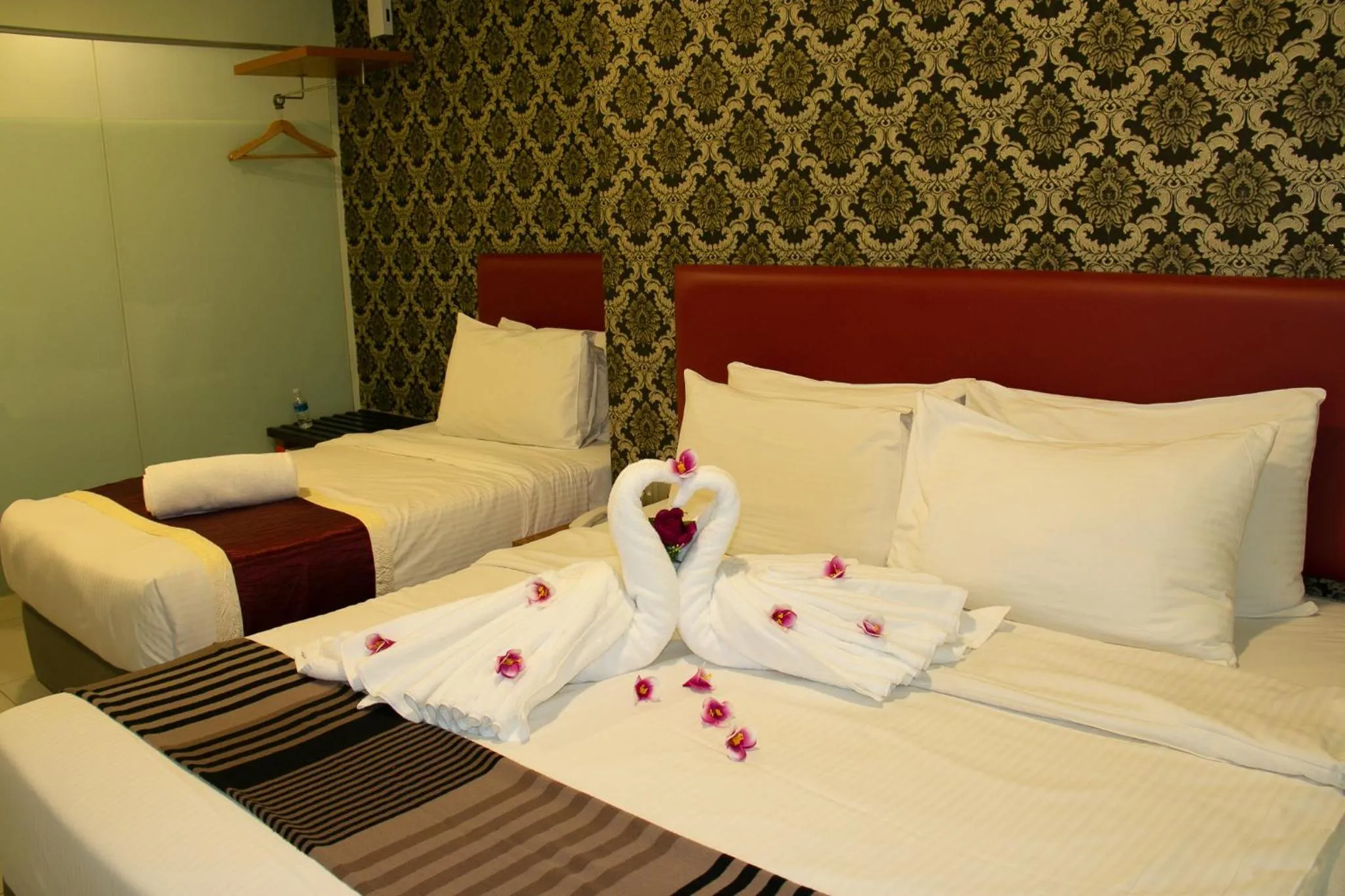 Bed in Prince 33 Hotel