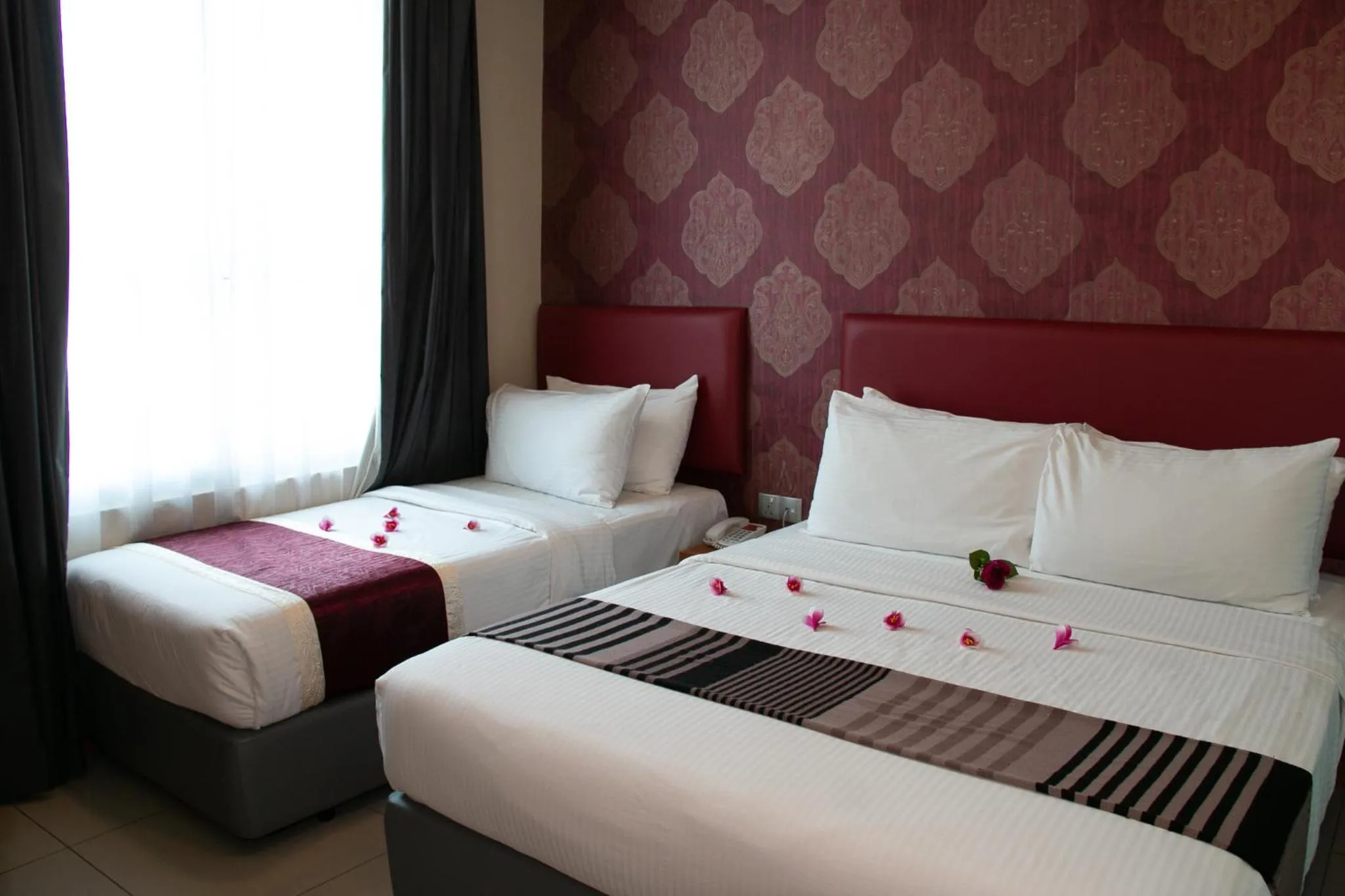 Bed in Prince 33 Hotel