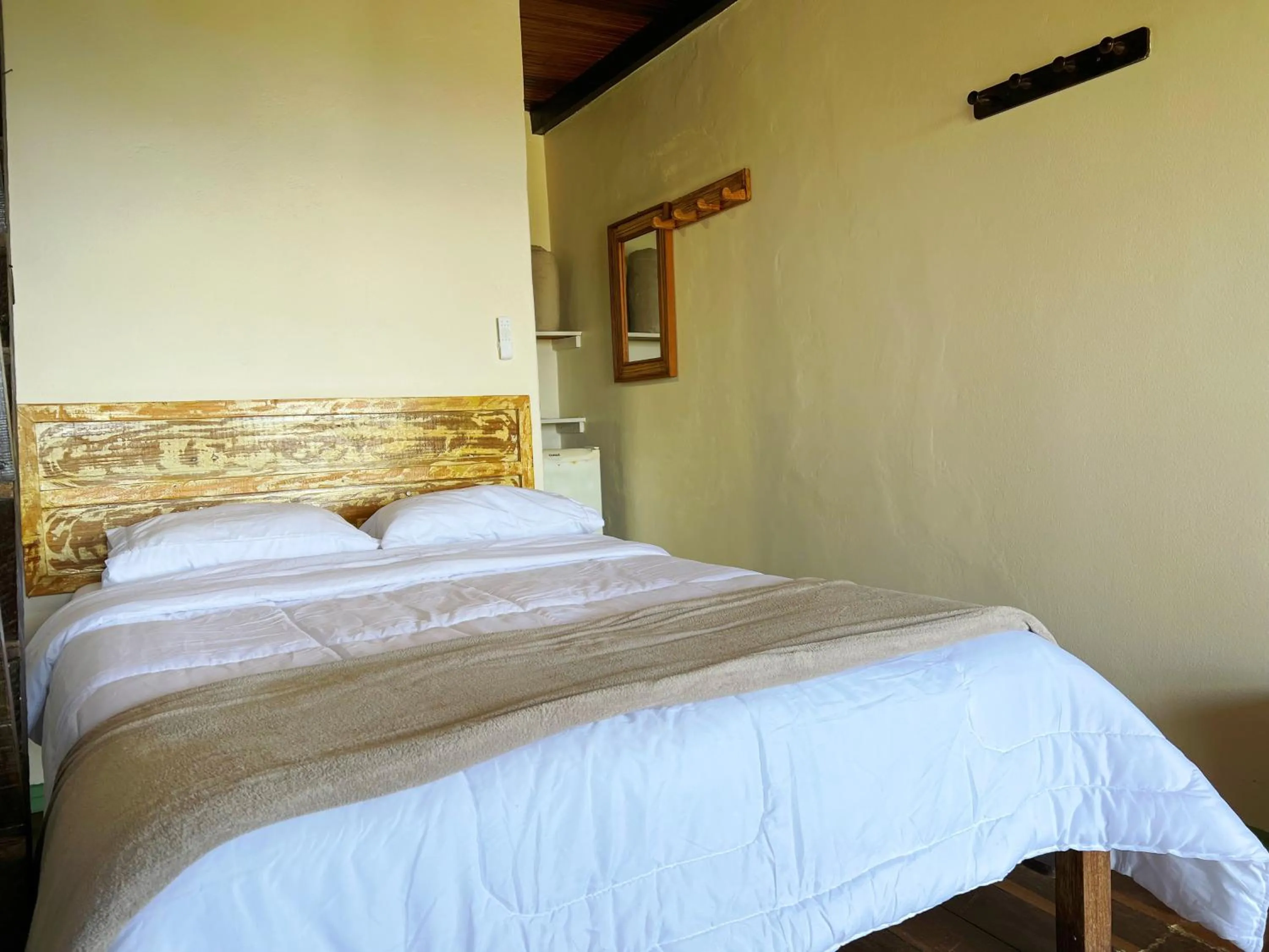 Bed in Pousada Bem Querer