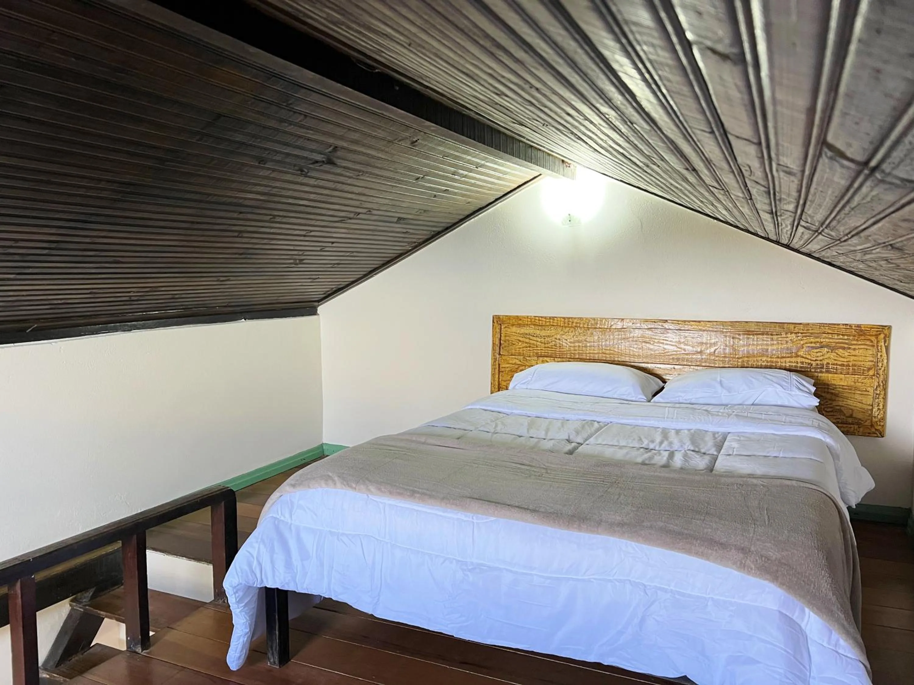 Bed in Pousada Bem Querer