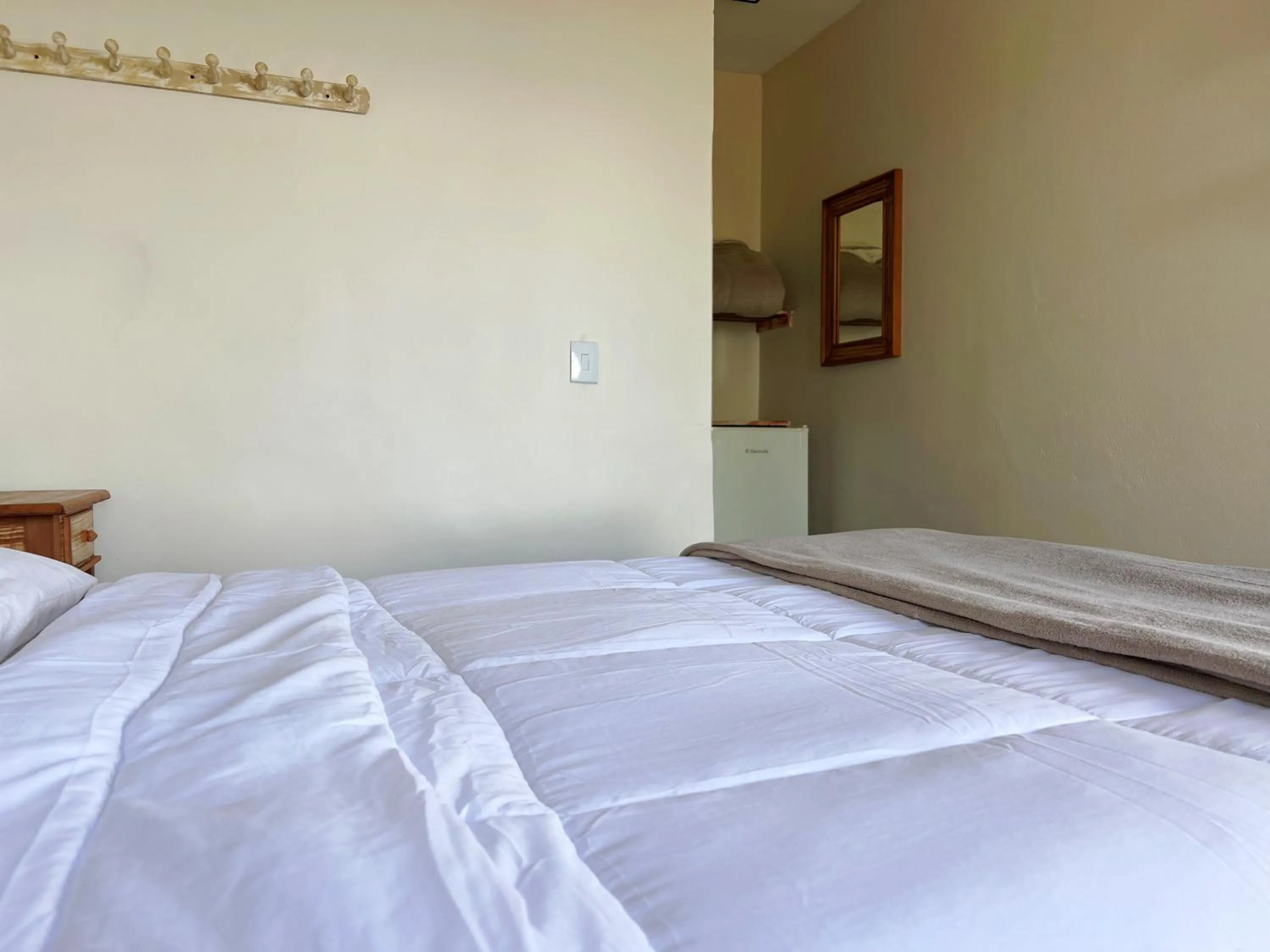 Bed in Pousada Bem Querer