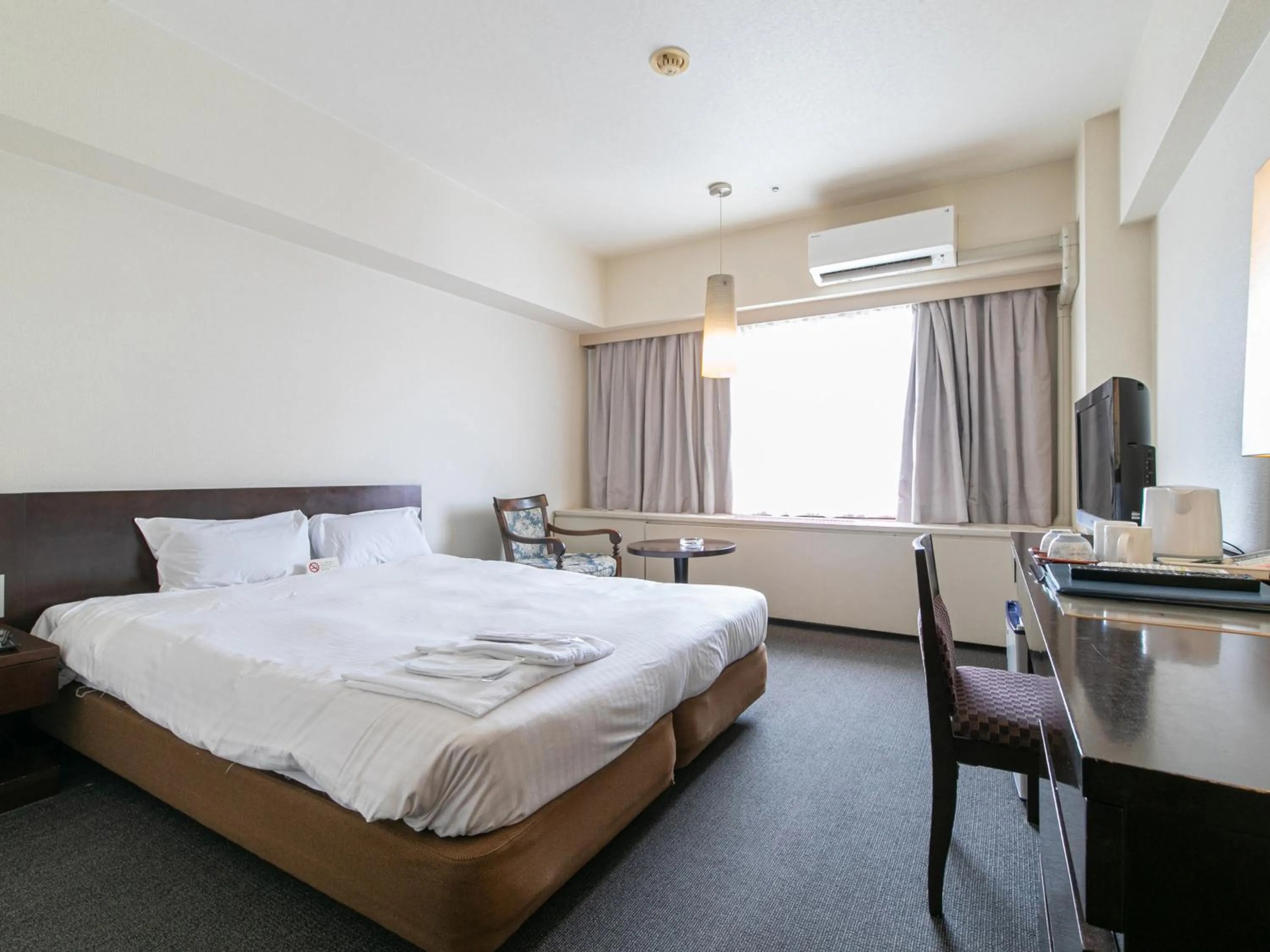 Bed in Victoria Inn Nagasaki