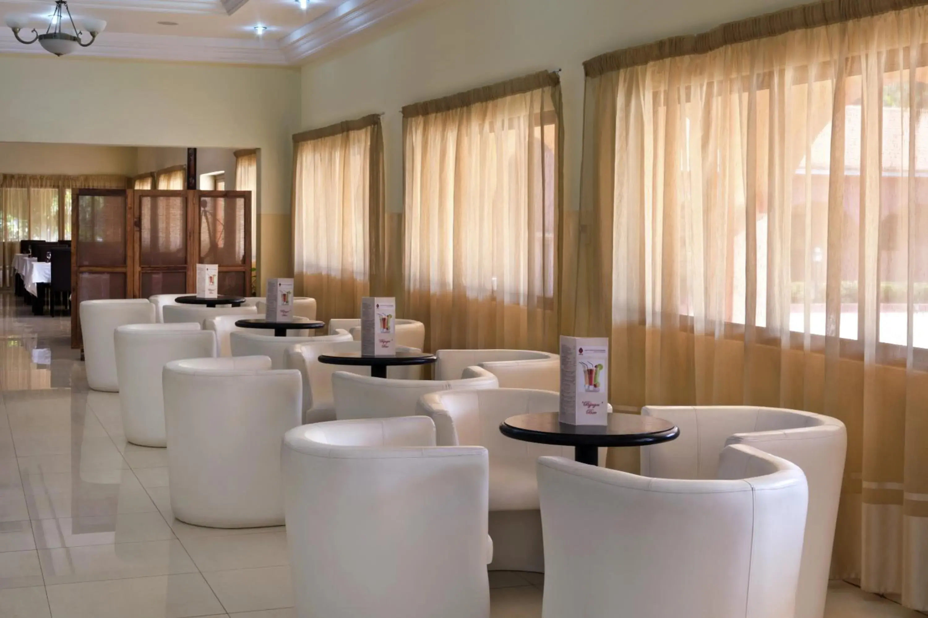 Lounge or bar in Dunia Hôtel Bissau Lounge or bar in Dunia Hôtel Bissau