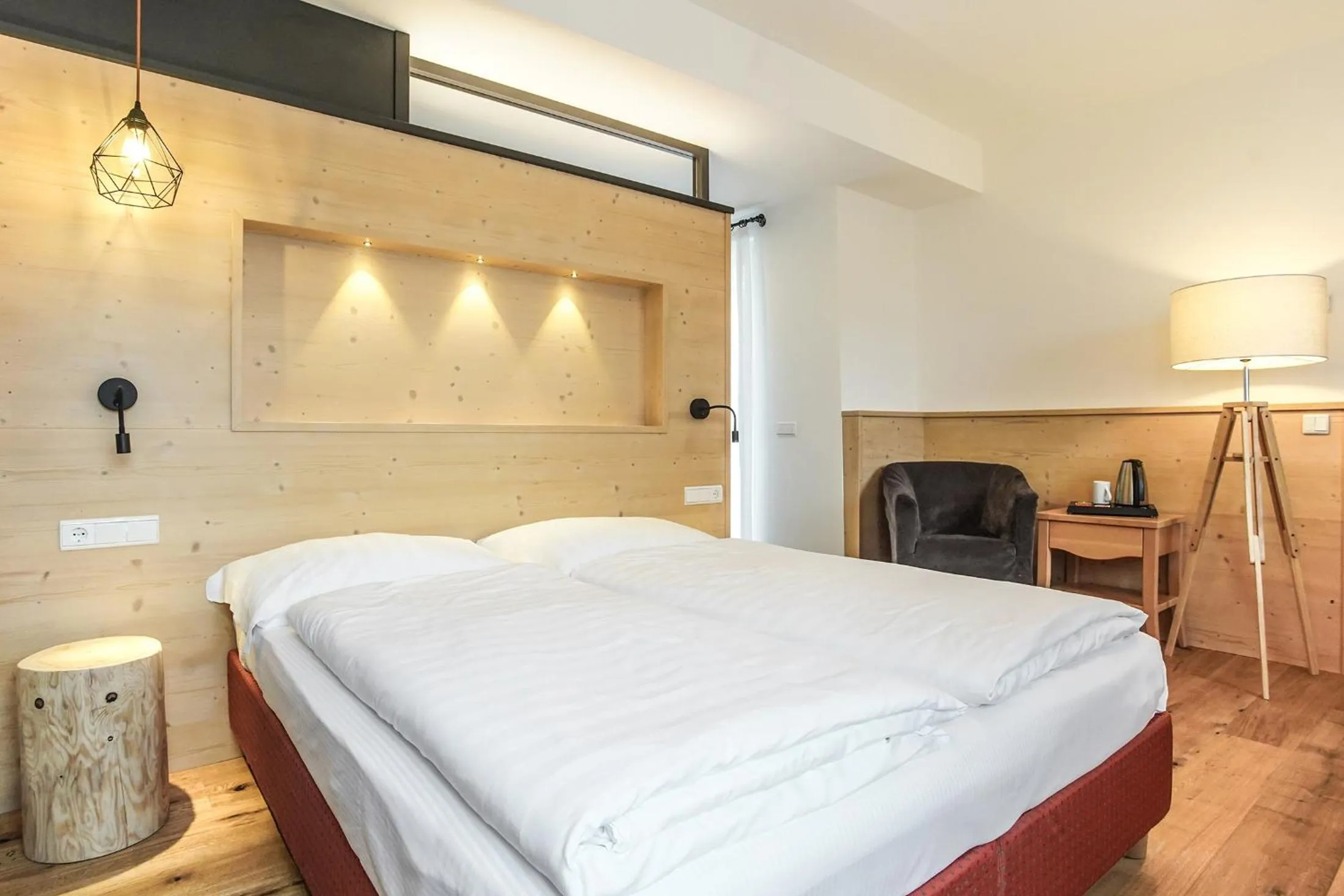 Bed in Berggasthof Locanda Alpina Dorfner