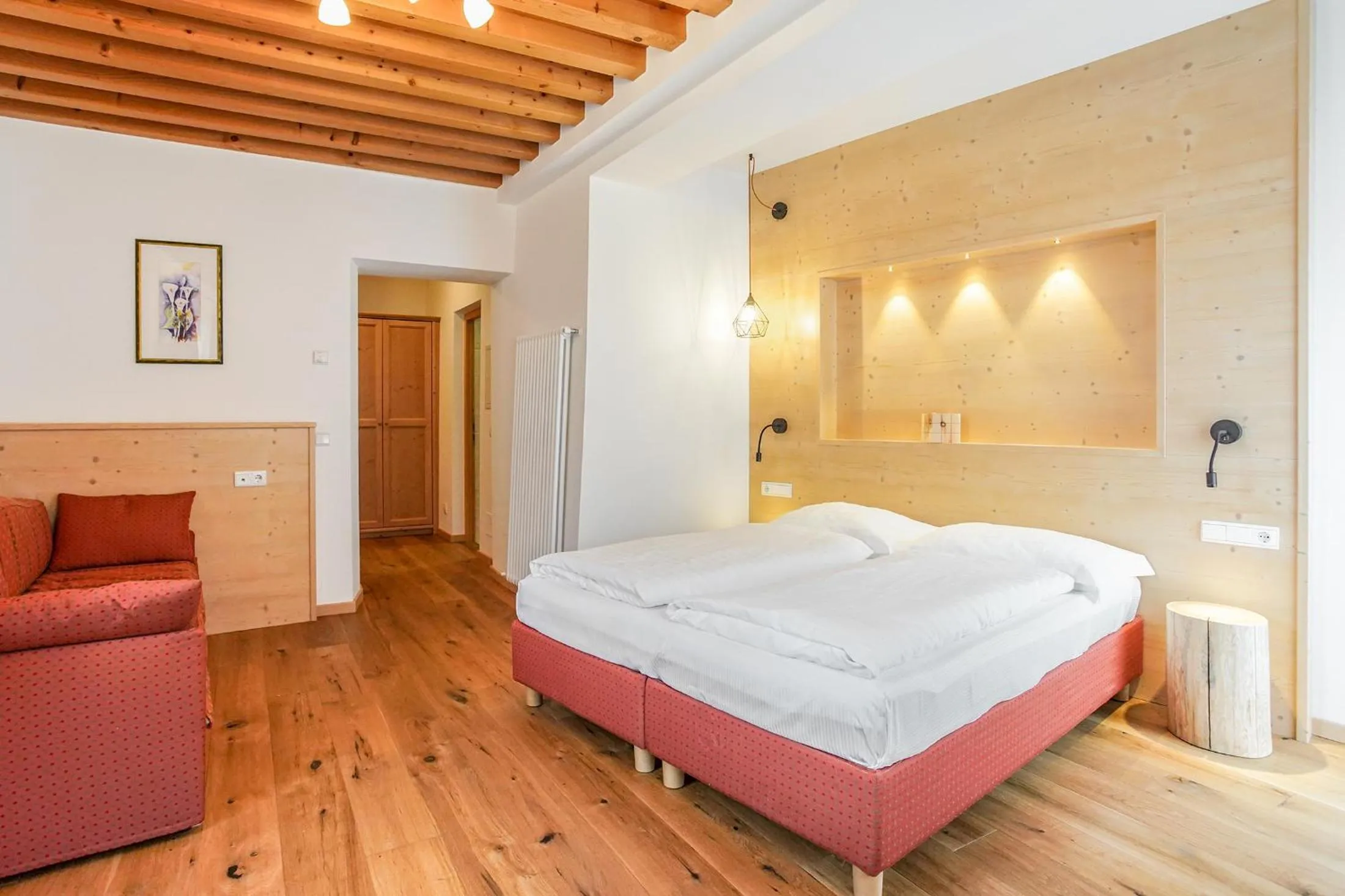 Bed in Berggasthof Locanda Alpina Dorfner