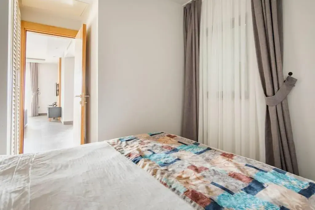 Bed in Degirmenburnu Residence Bed in Degirmenburnu Residence