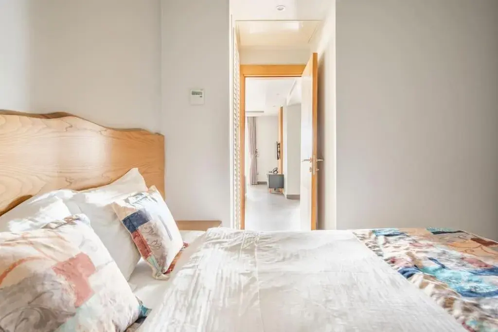 Bed in Degirmenburnu Residence Bed in Degirmenburnu Residence