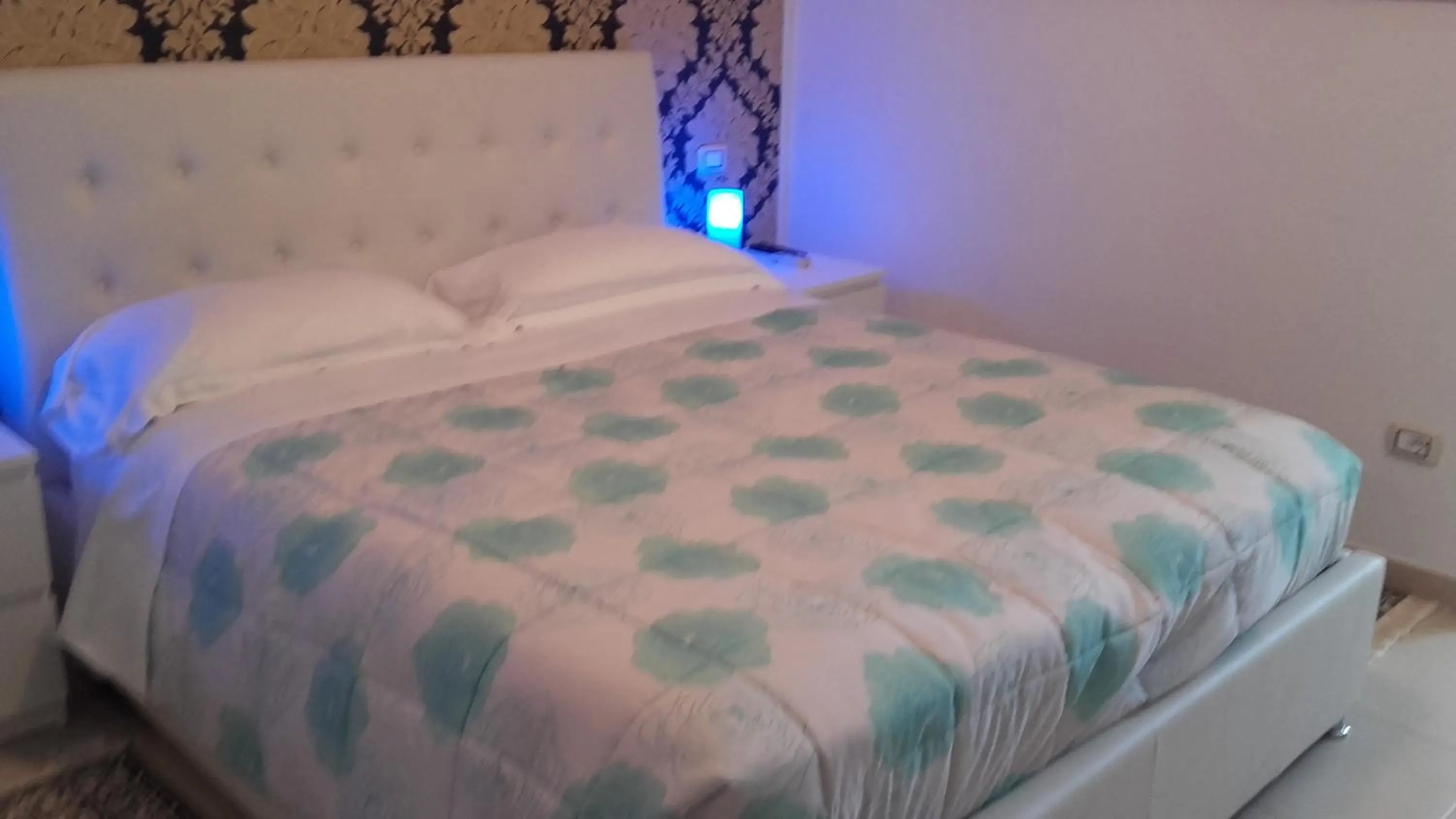 Bed in Le Tre Rose Bed & Breakfast