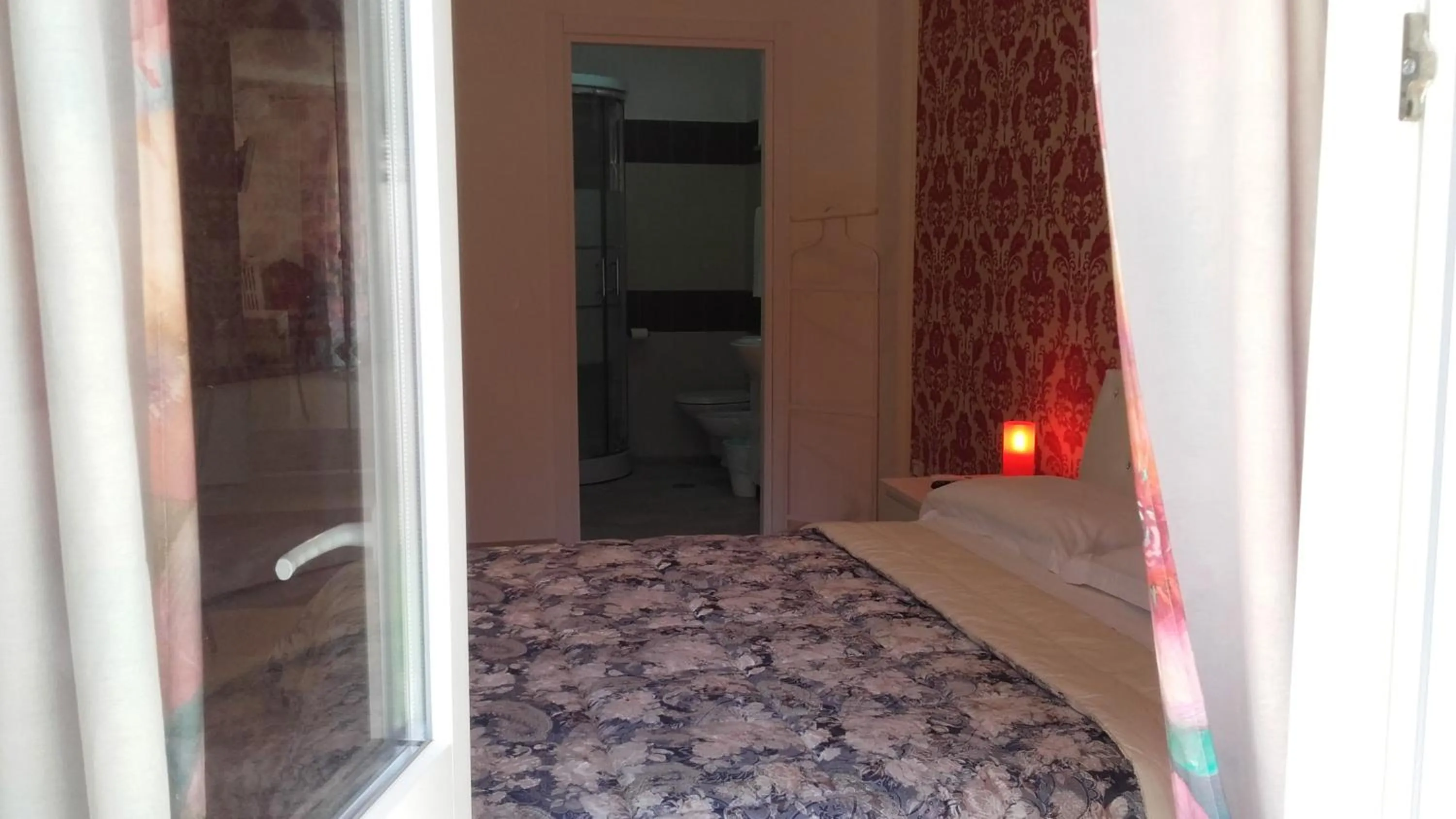 Bed in Le Tre Rose Bed & Breakfast