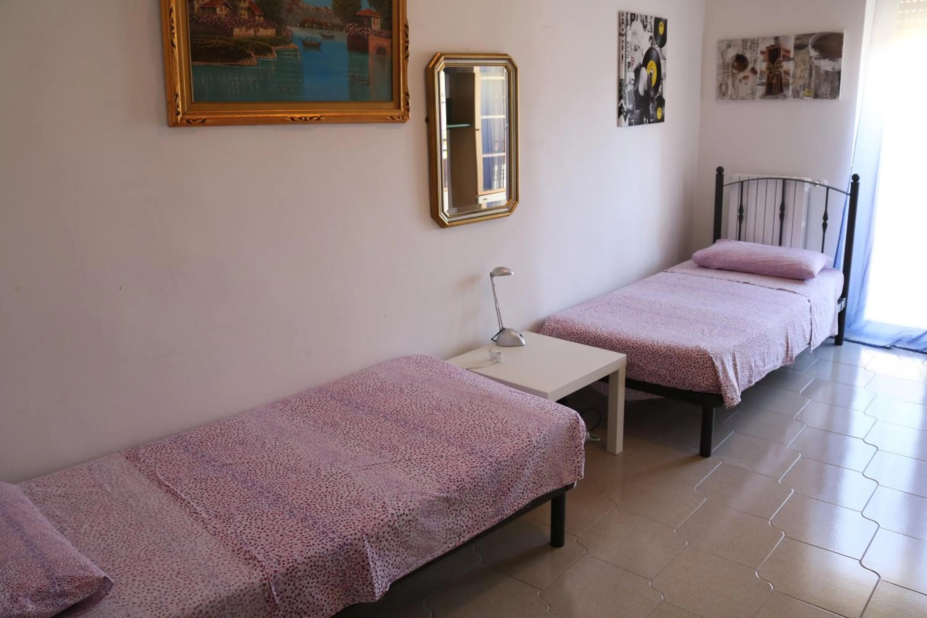 Bed in Le Tre Rose Bed & Breakfast